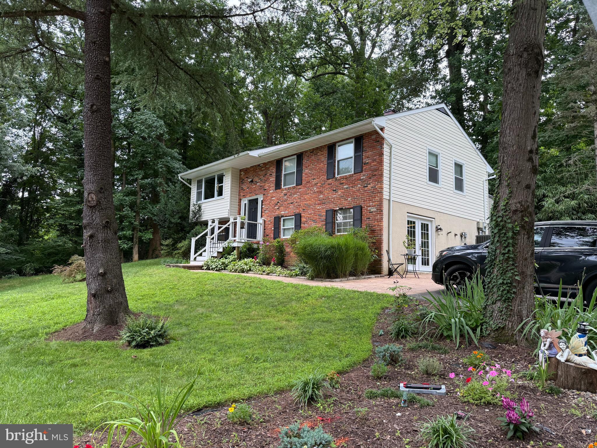 Welcome to this beautifully updated 1,566 sq ft home in the highly sought-after, water-oriented community of Herald Harbor! From the moment you step inside, you're greeted by the home’s unique character and nautical charm. The upper level features warm hardwood floors and an open living and dining area that flows seamlessly into a fully upgraded kitchen. Enjoy stunning granite countertops, a center island with breakfast bar, stainless steel appliances, and modern cabinetry - perfect for both everyday living and entertaining. Sliding glass doors open to the spacious deck - an ideal spot for your morning coffee or evening relaxation. Down the hall, you'll find a luxurious full bathroom with custom marble tile, completely remodeled in 2020. There’s also a generously sized bedroom with an ensuite half bath, and a large bedroom that was converted from two separate bedrooms - easily converted back, if desired. The fully finished lower level expands your living space with a large family room, a newly added bedroom and full bathroom, a bonus room/office, a spacious laundry area, and a workshop with walkout access to the driveway and parking area. Major updates in 2020 include a new roof, new HVAC, new hot water heater, and a brand-new septic system (installed just 6 months ago). Additionally, all windows have been replaced within the past several years. Nestled on a quiet, oversized lot surrounded by mature trees and lush gardens, this home offers a peaceful retreat that’s perfect for relaxing or entertaining. The Herald Harbor community provides exceptional amenities, including: A private community beach, Boat ramp, Park & Playground, Tennis & Basketball Courts, Pavilion & Scenic Walking Paths with water access for kayaks or canoes, a neighborhood Pub & Convenience Store, and Free Summer Concerts to enjoy with friends and family. All this just minutes from Annapolis, with easy access to Routes 50 and 97 make this a truly ideal place to call home. More Photos Coming Soon!