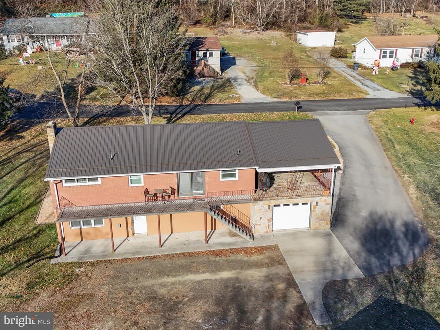 This one has everything you've been waiting for. Beautifully remodeled 3-bedroom home has so many modern updates. The kitchen was completely remodeled over the last few years with new cabinets, granite countertops and waterproof vinyl flooring throughout the home. Open kitchen, living, and dining area. The full bathroom upstairs was remodeled within the last few years and the downstairs bathroom was completely renovated in the past few months. The basement has been updated to make the perfect living space for entertaining guests, relaxing, creating a home office, gym, or so much more! The home includes multiple lots totaling around 3/4 an acre, giving you plenty of outdoor space. Other updates include new windows and new metal roof in 2023, inside doors replaced, Central AC/Heat pump, duct work, and hot water tank all done within the last 6 years. In addition to the heat pump, the home offers baseboard electric heat for back up and a wood-burn fireplace. 1 car garage with interior access through the basement. With a fresh new look and plenty of character, this home is move-in ready and waiting for you to make it your own.