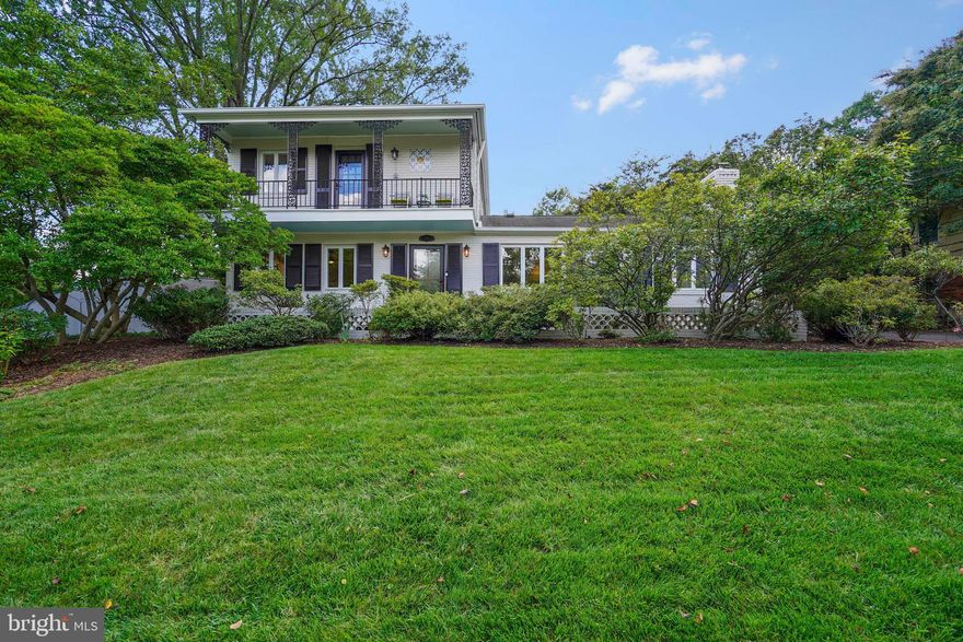 This lovely three bedroom plus primary suite and three full bath Colonial is one of the jewels of Clover, a well-established and prestigious neighborhood with a blend of old-time charm and modern age living.  With excellent curb appeal, this special home boasts a gorgeous newly hardscaped and landscaped lot with an abundance of beautiful plantings and a private rear yard offering tranquility and beauty amongst the Japanese maple and cherry trees.  Enjoy your mornings with coffee on the front balcony and your evenings in your private rear yard with fire pit on the slate patio and the nearby hot tub. Wrought-iron gates allow access to the rear yard while a slate walkway with attractive brick wall lead one to the front of the home.  Enter the home into a superbly designed yet unique and functional floor plan which is well-suited for everyday living as well as for large and small gatherings.  The welcoming foyer leads to the large living room with original woodburning marble-surround fireplace and hardwood flooring which carries throughout the main level.  The oversized dining room off the living room features a custom chandelier ($7000) which will convey with the home! The dining room and front hall lead to the casual areas of the home.  The library/family room features a woodburning fireplace and the floor-to-ceiling bookcases surround windows from which one can enjoy the lush vegetation of the rear yard. The laundry room features an updated washer and dryer.  Convenient doors lead to the driveway and garage with EV charger. The breakfast/sitting room, with woodburning fireplace, also looks out onto the tranquil back yard and a side door from this room and the kitchen opens to the covered slate patio.  The kitchen features inset natural cherry cabinetry resulting in a seamless finish with doors flush with the cabinetry. A useful pot-wall was improved by the present owners. It is one of their favorite features of the home! Exceptional privacy abounds for those who wish for one-level living. To the left of the foyer are two large bedrooms, office or guest rooms and an attractively finished full bath with a granite countertop and large walk-in fully tiled shower with seat.    

Proceed to the upper level of the home to the enviable primary suite with new beautifully renovated bath! The wonderful space features hardwood floors, the bedroom with pocket door and the adjoining sitting room, office or nursery. A charming Dutch door leads from the relaxation of the bedroom to the calming setting of the front balcony.  The bath completes the picture with granite countertops and two sinks atop beautiful cabinetry and a large fully tiled shower. 

Walk into the conveniently located floored attic with original wood flooring at the top of the upper stairwell! 

The lower level of the home offers exceptional living space and is filled with light from the legal egress windows installed in the family room and bedroom.  The family room with wide-plank wood-look vinyl flooring, great storage closets and sauna leads to the comfortable bedroom and the tastefully renovated full bath with large walk-in shower and utility room.  

The home extends to the outside with the bead-board ceiling over the expansive resealed patio.  Six architectural columns spatially enclose the area which includes seating for eight at the table and a sitting area for all to enjoy.  This exceptional social setting leads to the private rear yard from which to enjoy nature and the peacefulness of one’s surroundings.  

500 Crown View Drive is in an exceptional location: Bordered by King and Duke Streets and Janney’s Lane, it is minutes to Alexandria High School and MacArthur School, Bishop Ireton, the King Street Metro, the VRE line and the excellent shopping, restaurants, culture and fun of Old Town!