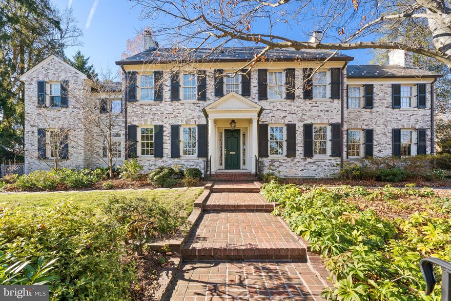 NEW PRICE! Privately appointed on an elevated 0.37 acre lot in the heart of Wesley Heights, 3024 44th St NW stands as a quintessential illustration of architectural grandeur, timeless design, and modern luxury. Boasting remarkably historic integrity, the 1926 limewashed brick Colonial features a seamless synthesis of ageless charm and updated amenities to include sprawling entertaining spaces, soaring ceilings, magnificent millwork, gleaming hardwood flooring, high-end appliances, and abundant natural light throughout its 4 levels and 7,900 total square feet. Breathtaking gardens, lush lawns and manicured landscaping encompass the expansive lot to provide utmost privacy and offer a serene escape within our nation’s capital. Showcasing an extravagant 6 Bedrooms, 5 Full Bathrooms and 1 Half Bathroom, this timelessly modern masterpiece is a true gem sited in a priceless locale. 
<br>
<br>
A brick pathway lined with lush greenery leads to the brick façade’s entryway, offering a peacefully warm welcome to the residence. The Main Level’s expansive entertaining spaces flank the entry foyer to include the Formal Dining and Living Rooms as well as the more informal Family Room and Study. Perfectly appointed in the rear of the residence’s Main Level, the Gourmet Kitchen and adjacent Butler’s Pantry are sure to delight any cooking enthusiast or avid host, boasting abundant marble counter space, top-of-the-line appliances and easy access to the breakfast and dining rooms. Featuring French doors leading to the rear dining terraces, al fresco gathering or year round poolside lounging  while overlooking the captivating gardens can be effortlessly enjoyed by all. 
<br>
<br>
The extensive Upper Level hosts an enviable Primary Suite oasis sure to enthrall any perspective owner. Debuting 10’ vaulted and cathedral ceilings throughout the spacious bedroom and adjoining sitting room, the sprawling suite features an enormous Dressing Room with 2 outfitted walk-in closets, a spa-like bathroom complete with dual vanity, soaking tub and steam stall shower, and a private balcony with garden views to top off the sweet respite. 3 additional Bedrooms, 2 Full Bathrooms, and a conveniently located Laundry Closet complete the Upper Level’s offerings. The Top Level showcases 2 guest bedrooms, each with gracious walk-in closets, a full bathroom, and a large attic/utility space. Offering abundant variability based on one’s needs, the Lower Level features a sprawling Recreation Room with Full Bathroom, abundant storage space and crawl space. A 2-Car Detached Garage completes the residence’s offerings. 
<br>
<br>
Boasting a timelessly curated and effortlessly expansive Wesley Heights masterpiece, this garden oasis offers the ultimate respite while providing the modern conveniences and luxuries of urban living in an unparalleled location.