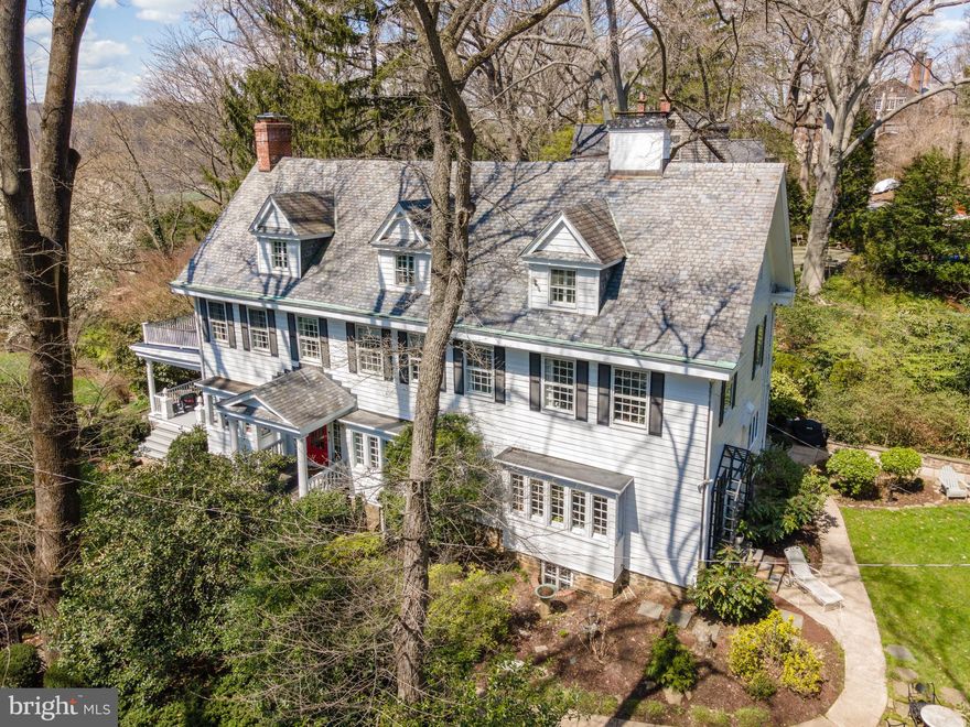 Exquisitely appointed and light-filled, 2 Hillside Road is a Roland Park gem that offers timeless elegance. This beautiful Neo-Colonial home has been tastefully restored and meticulously maintained by its current owners with the highest attention to detail and an eye toward preserving the home’s important architectural features. It is grand, yet warm, with beautiful proportions. 

Offering 6 bedrooms and 6 1/2 baths, and several additional versatile office/family room areas. You will appreciate the functional living areas that promote gracious daily living, and also allow for private family spaces – so important for today’s lifestyles. There is a wonderful flow throughout with direct access to the two large side yards from the primary living areas.  Another distinctive feature of this gracious Roland Park home is how beautifully it is sited on a corner lot surrounded by mature trees, so you feel as though you are in a private oasis. This home is perfect for entertaining, both on a large and small scale.  Imagine hosting guests on a lovely spring or summer evening on your expansive side porch, overlooking the beautifully landscaped gardens and sweeping lawn. 

Classic architectural features include a gracious main entrance hall, well-portioned rooms, high ceilings, built-in window seats, 4 fireplaces, 4 first-level French door exits, pocket doors, original cypress siding, heart pine flooring, and a well-maintained peaked slate roof.  All original features are circa 1901. 

The welcoming front iron gate provides a gracious entrance between historic elm trees and tall trees all providing shade.  The 1st and 2nd floors have west exposure open porches, both from the living room and primary bedroom, and look out onto the beautiful green yards below.  You’ll love the extraordinary views from the home of Rusty Rocks, the original Roland Park estate home once owned by Edward Bouton, the founder of the Roland Park Company.  In addition, an interesting historical note is that the Deed owner in 1918 was listed as Emily H. Symington, Mother of  W. Stuart Symington, US Senator, and US Democratic Presidential Candidate in 1960.

Additional features and important updates include a gourmet kitchen with a Wolf stove, Sub Zero refrigerator, a Bosch dishwasher, and marble counters, a newly renovated primary bath, central, zoned A/C  and dual heating (both radiator and forced air), updated electrical and plumbing, plus many more, making this home turn-key.  The clean large basement offers so many possibilities with 10-foot ceilings,  an exercise/billiard room, a full bath, a workroom, and 3 storage rooms which would also be perfect for a wine collection.  

Be prepared to fall in love with 2 Hillside Road and the lovely landscape that surrounds it.  This is a home you must experience in person to fully appreciate.