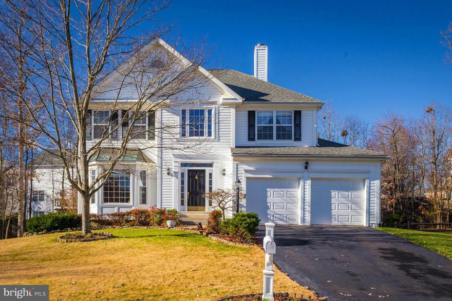 **Premium 1/3 Acre Cul De Sac Lot with Extensive Landscaping Backs to Trees!!**Breathtaking Sunroom off of Kitchen & Family Rm makes this home Bright & Open* 3,700fin sqft on 3 Lvls* Spa-Inspired $15k+ Master Bath Renovation* Granite Kitchen Counters** Walk Out LL w/Large RecRm, Wetbar, Bedrm, Office & Workshop* Near VA Gateway/Atlas Walk/Shopping/Dining/Entertainment Complex