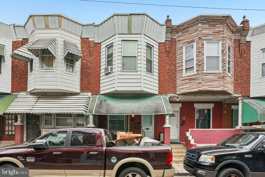 Fully rented duplex in the heart of West Philadelphia, offering immediate cash flow and strong income potential. Enter from the covered front porch into a shared foyer with access to both units. Unit 1 occupies the first floor and features a spacious living room with a decorative fireplace and mantel, an updated kitchen, and a full bathroom with a window and tiled tub/shower combo. This unit also includes a dedicated laundry room with direct access to the rear patio, a generously sized bedroom, and exclusive access to the full basement. The basement is partially finished, providing flexible space ideal for a rec room or additional living area, along with an unfinished section perfect for storage and a convenient half bathroom. Unit 2 is located on the second floor and offers a large eat-in kitchen, two spacious bedrooms, and a full hall bathroom. Both units are currently rented on month-to-month leases at $1,500 TOTAL (Unit 1 $700, Unit 2 $800) presenting excellent rental income and future upside. Conveniently located near public transportation, universities, shopping, and dining. A solid addition to any investment portfolio. Mortgage savings may be available for buyers of this listing.