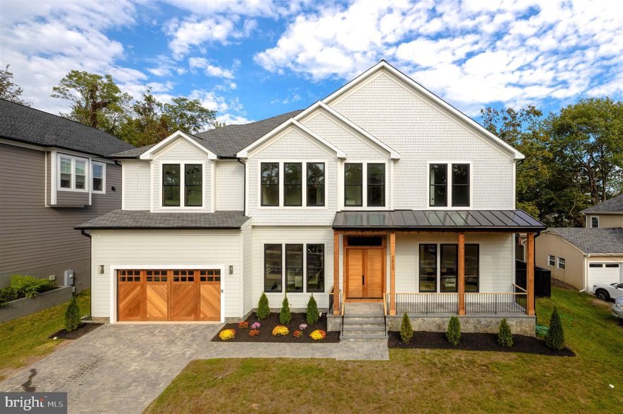 *** MEET THE BUILDER open house Sunday, Dec 12, 2-4 pm *** Exceptional, and move-in ready in an ideal location!  Amazing build QUALITY rarely found, as exemplified by: oversized custom Anderson windows, 4 piece trim package, open plan with 10’-12’ ceilings, and so many stunning and thoughtful details that make this home read like a custom build. At the heart of the home, the gourmet kitchen offers a superior appliance package, large quartz island, beautiful cabinetry … and a fully-equipped second caterer’s kitchen.  The main level also has an en-suite bedroom and separate office.  At the center of the large family room is a gorgeous contemporary gas fireplace.  Upstairs are 5 spacious bedrooms, each en-suite.  The primary bedroom/bath is the ultimate in luxury!  Downstairs is a very open and spacious recreation room with wet bar, exercise room, media room, en-suite bedroom and another powder room.  This elevator-ready home is perfect for entertaining, both inside and out back on the large lot.
With almost 8000 finished sq. ft. of open living space on prestigious Military Road, this home is conveniently located 1 light to DC AND in a wonderful North Arlington neighborhood. Surrounded by 3 popular parks, close to shops and restaurants, and feeding into sought-after schools, this exceptional home offers convenience AND unparalleled luxury.