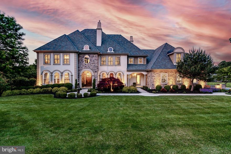 Discriminating buyers. Your search is over. 1015 Squires Drive is coming to the market. This truly CUSTOM home has been methodically built, by one of Chester Counties leading engineers, in collaboration with Manos Kavadias, for his own primary residence for his family. No expense was spared in the construction or the finishes. Located on a private lane in the coveted community of Squires Lea, this estate home was built for entertaining on a very grand scale. As you enter the home from a leaded glass door into a grand central hall that is the length of the house, showcasing African Walnut flooring, you will see how perfectly this floor plan unfolds. The main level is flooded with natural light though the oversized Anderson 400 series arched windows in both the spacious and elegant dining room and huge library, in the front of the home. Just off the dining room is a butler's pantry with a whimsical Mexican sink and has complementary tiles in the back splash and a truly cavernous walk in pantry. The kitchen is the heart of the home boasting custom cabinetry, enormous central island with a beverage fridge, granite countertops, gas cooktop, built in oven and microwave, coffee bar, designer lighting, a hand hammered copper sink, the breakfast room is encapsulated with more architectural windows, showcasing dramatic views of the gardens and pond. Just off the Kitchen is the Lanai, this was added for outdoor dining and intimate family entertaining, boasting stately columns and hand wrought iron balustrade. The family room is well appointed and cozy revealing an intricately laid pine flooring with antique nails that gives the room a casually elegant touch, a gas fireplace with a stone and cherry surround that is naturally aged with no stain, motorized shades, a back staircase and a pocket door that connects you to the mud room with the powder bath. Ascending the main staircase you come to an over sized landing that gives commanding views of the lot. The primary suite is luxury redefined. Though its double doors you will see the dramatic trayed ceiling, custom light fixture, a charming flex living room space with another fireplace, which can be used in so many ways, two walk in closets, a fantastic en suite bath with a full sized soaking tub, separate shower, two individual vanities, made of soap stone, that give you all the space you each need for getting ready, at the same time, and a private commode room. Down the hallway is the first ensuite bedroom then two additional oversized bedrooms with another full bath. ADDITIONALLY another flex room that can be 5th bedroom or office. This room has a direct and private rear staircase that leads you to the garage which is an oversized 4 car garage boasting 11 foot bays and a depth of 28 feet to accommodate the largest SUV or truck with generous room for pedestrian traffic AND storage. The lower level of this residence is an entertainers paradise! UNMATCHABLE. Offering a true to life sized bar room that was salvaged from the historic Turks Head Bar in West Chester that was removed in entirety and reconstructed in the home. A complete home gym, media area, wine/beer closet with antique doors from a 1900 year old pharmacy, a cherry wood ceiling, powder bath, a custom Nano wall opening that is 17 feet wide and opens seamlessly to allow the perfect outside/inside transition for events giving access to great flagstone GROTTO and the outdoor Kitchen, covered by a custom pergola with accent lighting built with in. Other mentionables are over $200,000 in landscaping and hardscaping done by Finnerty Landscape LLC, an owned 1000 gallon propane tank, entire home Generac generator, all wood trim throughout, rare soils brought in for the perennial beds and specimen plantings, extensive rooms of storage, built in speakers throughout the home.... and so much more to discover, when you see this exceptional home.