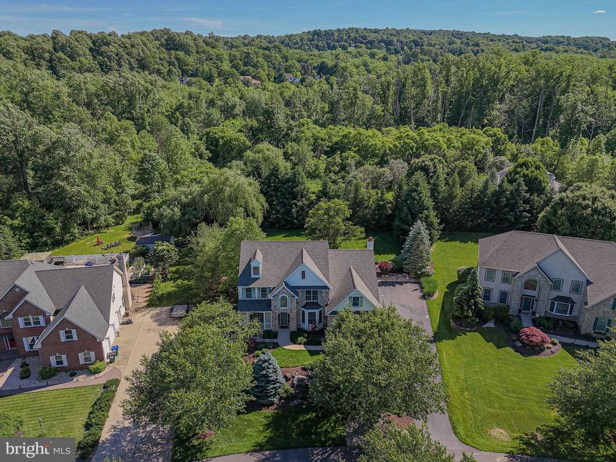 Welcome to this beautifully maintained 4-bedroom, 4-full bathroom Colonial style home, nestled in this charming Upper Saucon Twp neighborhood. This Ruhmel built home offers all the allure and amenities of classic and timeless living. Spread across three spacious floors of living area, the interior dazzles with warm, natural light that spills over hardwood floors, adding to the ambiance of sophisticated simplicity. Kitchen is a chef's delight boasting gorgeous leather-finish granite countertops that sit atop rich cherry cabinets, encouraging your culinary creativity. For those who love to host, the open floor plan allows for easy movement and interaction, while the central HVAC system keeps you comfortable year-round. Intimacy meets luxuriousness in the large master suite which offers an attached fitness/office room provides versatility to customize according to your lifestyle. Each of the bedrooms are beautifully appointed, ensuring room and comfort for everyone. Step outside to find your private and serene backyard – a manicured landscape just waiting to create moments to remember. This Coopersburg gem offers more than just a stunning home. Its strategic location is only a short distance from the Promenade Shopping Center, enabling easy access to premium shopping and dining choices. Additionally, it facilitates effortless commuting with major routes 309, 78, and PA Turnpike conveniently close. This is more than a house, it's the lifestyle you've been waiting for.