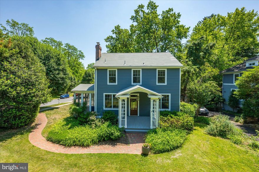 What a Grand Dame!   Gorgeous, 1935 front porch colonial beauty is ready for her next chapter!  This stunning 4-level, 4-bedroom, 2 full bath home, is sited on a private, fenced 1/3 acre, and offers an exceptional space to call your own!  MAIN LEVEL FEATURES:  Enter through a large (think outdoor living room!), charming oversized portico with a pitched roof, arch detail,  bead board ceiling, decorative lattice work at  sides and ceiling fan – perfect for a pair of rocking chairs; newly refinished hardwood floors throughout; large, light bathed Living Room anchored by the brick surround fireplace, the fireplace has been converted to gas, but the original mantle remains.  The fireplace is perfectly flanked by 2 high privacy windows, and an oversized double window facing the porch; the Living Room spills into the beautiful Family Room/Amazing Office Space with a French door into the large, screened porch at the side of the house with bead board ceiling and ceiling fan, and double sliding doors onto the large rear deck with a perfect view of the large lot, and stairs down to it.  The Living Room flows across the gracious entry to the holiday-dinner-sized Dining Room with large windows on two sides and is open to the updated Kitchen with mission style maple cabinetry, pass through all glass decorative cabinet, granite countertops, stainless steel appliances, and walk-in pantry.
UPPER-LEVEL FEATURES:
Refinished hardwood floors throughout; wide stairway with beautiful window at landing; transom window entry at each bedroom; Primary Suite with oversized windows, ceiling fan, walk-in closet and Primary Bath with tub, and tumbled marble look tile surround to ceiling; Bedroom #2 with large closet and 2 windows; Bedroom #3 with 2 windows, and custom closet with mirror door; Full Bath #2 with transom entry, large vanity, ceramic floors and tile tub surround
UPPER-LEVEL TWO: Bedroom #4 with separate Bedroom area and Living Room/Office, brand new carpet, recessed lighting and charming seating ledgeLOWER LEVEL:Unfinished (waiting for you), large space with Washer and Dryer and exit to backyard.  OTHER FEATURES: Outdoor living space on 3 sides of the home; detached 2-car garage as is ; front porch planks 2023; 200 amp service heavy up 2000; Kitchen remodel 2003; main water/sewer line replaced 2006; Windows and Siding 2008; gas fireplace conversion 2013; Nest thermostats; Hot Water Heater 2017; Fence 2020; Nest keyless lock; AC 2021; one minute to 495; walk to Old Town Kensington (Baby Cat, Dish & Dram, Frankly Pizza, Safeway (Starbucks); Post Office; Weekend Farmer’s Market; Antiques Row; MARC Train Station; quick trip to Kensington Crossing (Chipotle, Stronsniders, Five Guys, 7-11, conveniences), easy walk to the Capital Crescent Trail