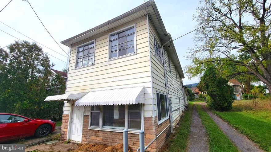 LARGE HOME IN LAVALE MARYLAND FEATURES 3 BEDROOMS AND 2 FULL BATHS.  A MAIN LEVEL LAUNDRY.  LOVELY SUNROOMS AND A TWO CAR GARAGE WITH TONS OF STORAGE  ABOVE GARAGE.  THIS HOME COULD BE CONVERTED TO A DUPLEX AS THERE ARE AREADY 2 KITCHEN LOCATIONS.