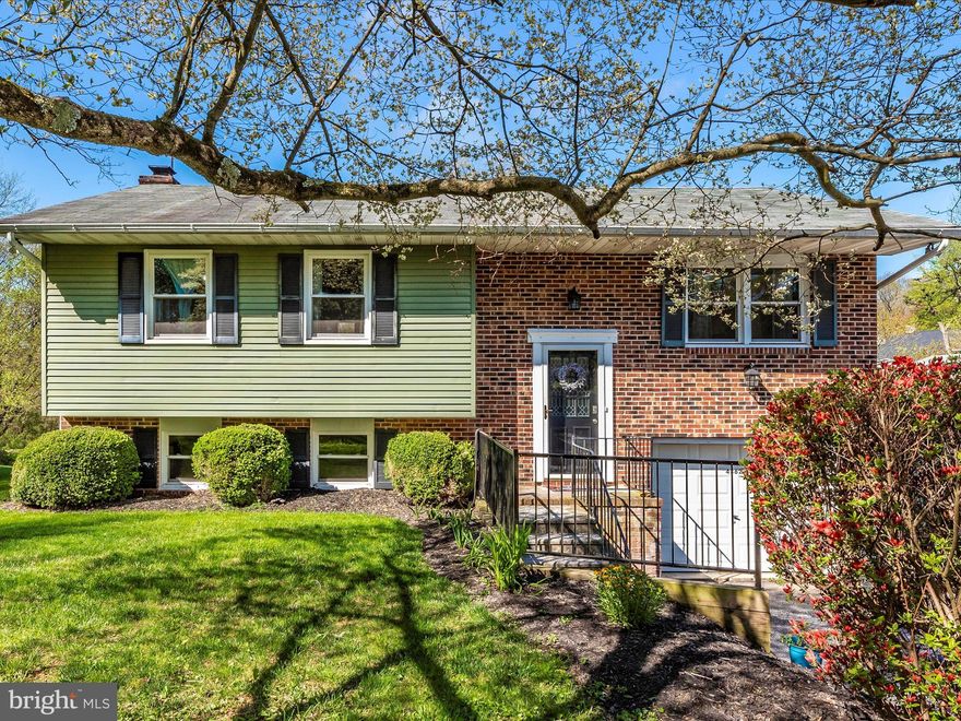 This charming 3 bedroom, 2 full bath, Split Foyer home  boasts a spacious open-concept kitchen, dining and living room. Perfect for family gatherings. The kitchen features stainless steel appliances. Natural light floods the living room through the large front window, while the deck offers a private, serene spot for your morning coffee, while taking in the beauty and sounds of nature. The primary bedroom offers  a stunning ceramic tile walk-in shower and a nice size closet with a trendy barn door. There are 2 other sizable bedrooms and full bath to round out the main living level. Downstairs you will find, a cozy family room  with a woodstove, (nifty vent in ceiling to allow for upper level heating) and a bar area, ideal for entertaining or snuggling up on chilly winter nights! There is additional storage in the laundry room, and access to the  attached single car garage, which could easily be converted into additional living space. The detached 2 car garage is ideal for a car enthusiast or would make a great man-cave!  All this nestled on over a 1 acre lot and is move in ready! Schedule your showing today...it won't last long!