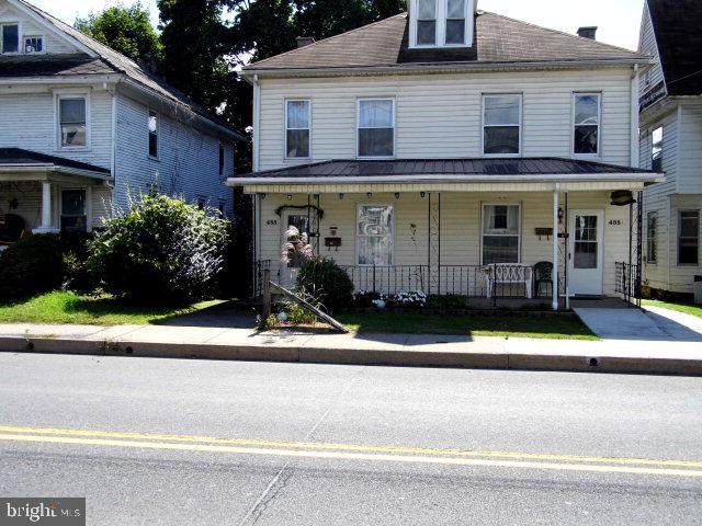 1/2 double, ready to move in. Vinyl siding, off street parking, some thermo windows, front and rear porches. Privacy fence.