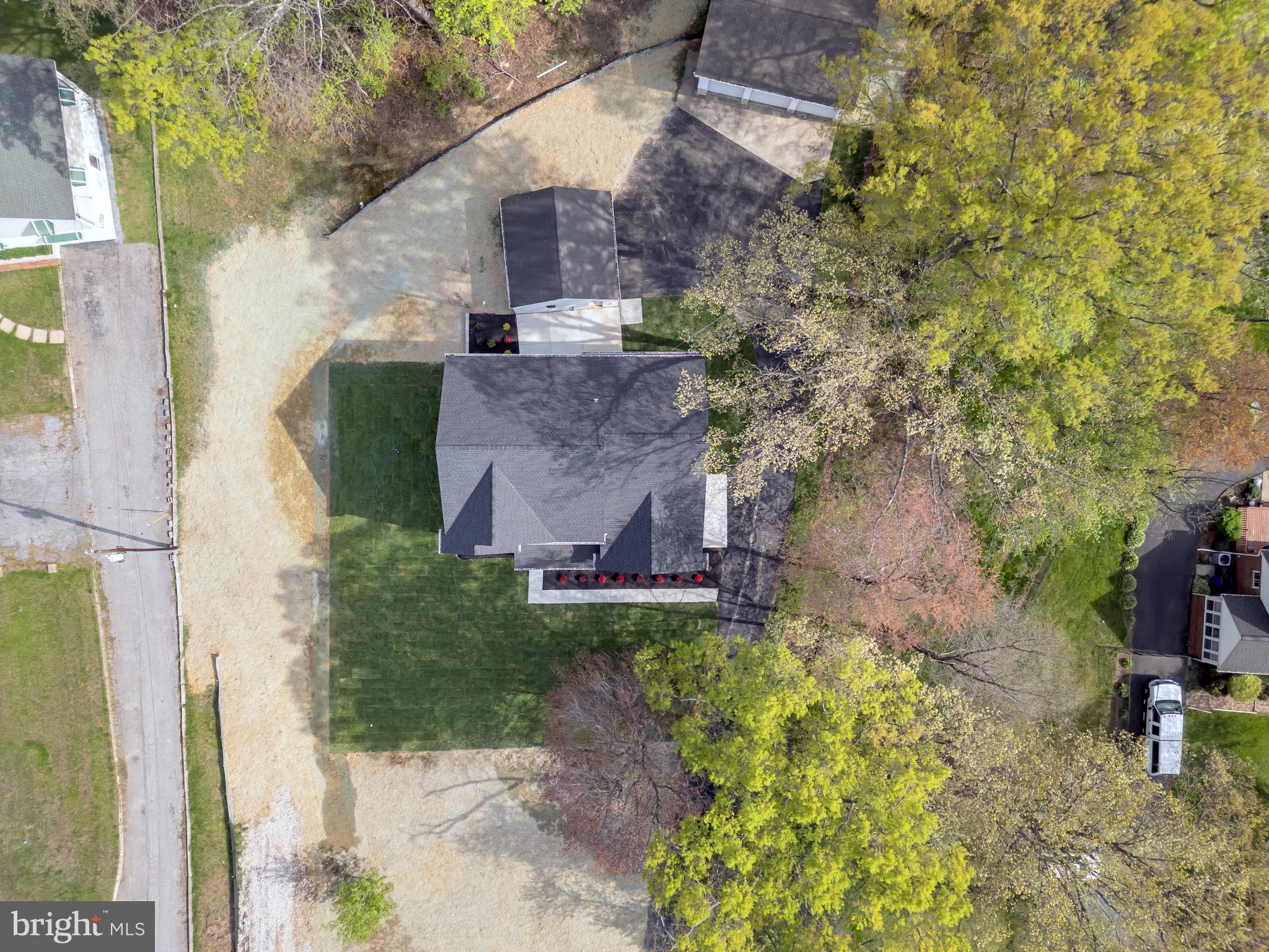 Includes almost 2 acres with new built house with 2 detached garages totaling 7 parking spaces under subdivision which 2nd lot will include pan handle and existing storage shed
