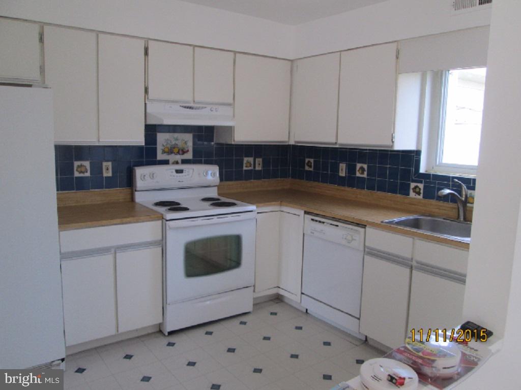 Unique 2BR Den 2BA in Pikesville: Rarely available 2nd floor 2 den condo in upper Park Heights area. Enter into your garage without leaving the building. Relax on your private balcony with over 300 square ft. and is equipped with built-in storage compartments to hide away grill or lounge chairs. The living room is quite spacious with a fireplace. Light wood color laminate flooring throughout the home. There are many great uses for the den area such as entertaining, home office, library or exercise room. The kitchen includes ample appliances, pantry, and view to outside. The bedrooms are large enough for a queen or a king-size bed. The master bedroom tons of closet space. Call today to schedule a viewing. This one will go fast, DON'T MISS IT!