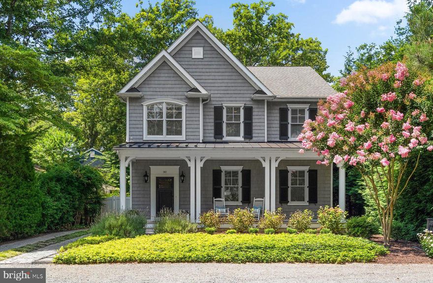 Experience Rehoboth Beach living in this beautiful custom-built home, perfectly situated in the heart of the Pines! This exquisite residence boasts 4 spacious bedrooms, one of which is currently utilized as a den, offering flexibility to suit your lifestyle needs. Upon entering, you'll be captivated by the beautiful hardwood floors that flow seamlessly throughout the home. The gourmet kitchen is a chef's dream, featuring classic honed granite countertops, top-of-the-line stainless appliances, and a cozy built-in breakfast nook, ideal for enjoying your morning coffee! The all-season porch provides a perfect space for relaxation, leading out to an impressive, fenced yard. This outdoor oasis includes a beautifully designed patio area with comfortable seating perfect for entertaining guests or enjoying a quiet evening under the stars. Each of the spacious bedrooms on the second level is a private retreat, complete with custom closets and ensuite baths adorned with elegant tile work. The basement offers ample storage space for beach toys, ensuring a clutter-free living environment. This home combines luxury, comfort, and convenience, making it an exceptional opportunity for those seeking an unparalleled living experience in downtown Rehoboth.