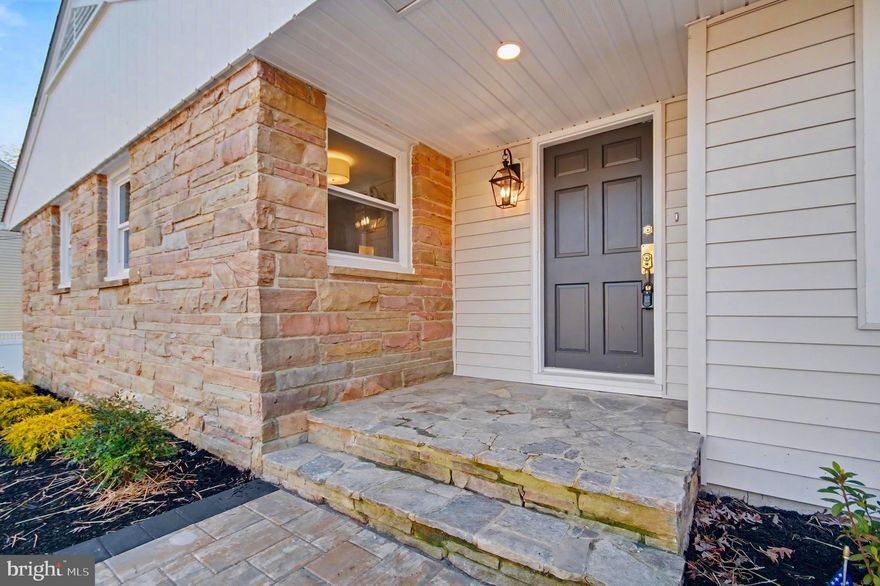 Welcome to 123 Spruce Lane, a completely renovated home in the sought-after waterfront community of Hillsmere Shores—where every detail has been thoughtfully redesigned to offer the feel and function of new construction.

This stunning home has been fully transformed from top to bottom. Everything has been replaced—including a brand-new roof, HVAC system, hot water heater, water conditioning system, radon mitigation system, windows, flooring, and more. Simply put, they didn’t miss a thing.

The gourmet kitchen anchors the home with an open-concept design that flows seamlessly into the family and dining rooms—perfect for entertaining and everyday living. Walls were thoughtfully reconfigured to create a bright, open floor plan designed for today’s lifestyle. The main-level family room features a cozy fireplace and beautifully restored custom built-in bookcases, preserving the character of the home while blending modern style.

The primary suite is a true retreat, featuring a newly added walk-in closet and a luxurious, fully renovated bath with double vanities. Two additional beautifully renovated full baths, including a guest bath with double sinks, offer both style and convenience.

The lower level is now fully finished and ready to be enjoyed, offering a second fireplace, recreation room, bedroom, and a nicely renovated full bath—ideal for guests, extended family, or additional living space.

An abundance of natural light fills the home, thanks to new windows throughout, a stunning bay window at the front, and a private rear-corner office surrounded by windows on all sides—an ideal work-from-home space.

Outside, the lot has been professionally cleared and refreshed, with weeds and dying trees removed and new plantings added, leaving a clean slate for new owners to personalize the outdoor space to their liking.

Additional features include a large two-car garage with new doors and openers, adding both convenience and storage.

This exceptional renovation was designed and executed by Frame House, known for creating homes tailored to today’s busy, active lifestyles—perfect for entertaining, hosting, and everyday comfort.

All of this is located within the waterfront community of Hillsmere Shores, offering a private beach and playground, two marinas with boat launches, over 100 boat slips, kayak racks and launches, and a community pool (membership subject to availability). The entrance to Quiet Waters Park is within walking distance, and Downtown Annapolis—with its dining, shopping, and waterfront charm—is just minutes away.

This is a rare opportunity to own a fully renovated, move-in-ready home in one of Annapolis’ most beloved communities. A truly special property that will not last long.