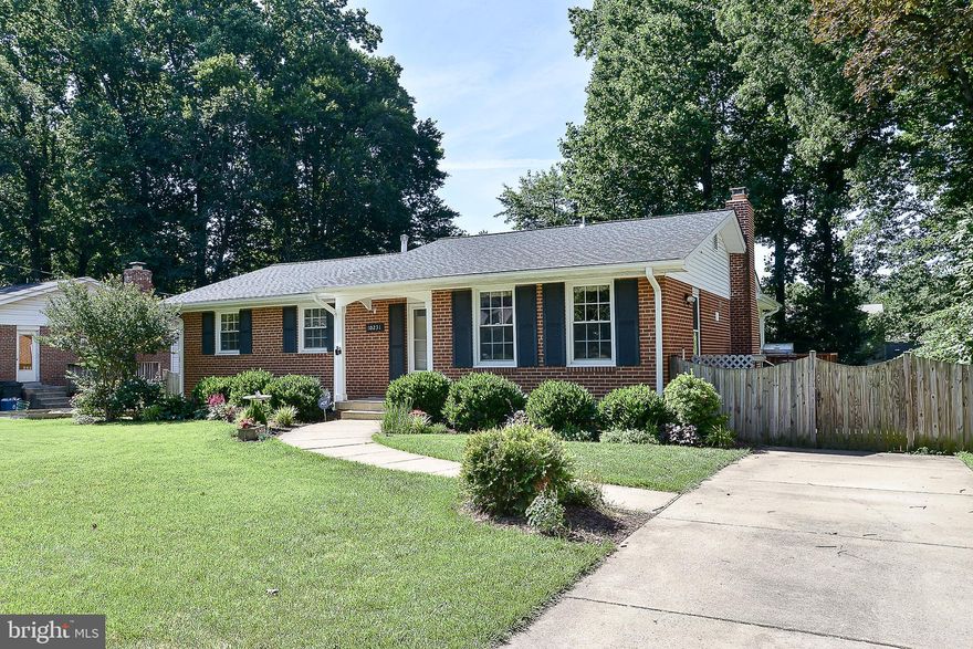 Beautiful 5BR 3BA rambler in sought after Mosby Woods. Wonderful home with updates throughout! Updated eat-in kitchen with corian countertops, stainless steel appliances, hardwood flooring, recessed lighting & lots of cabinet space! Large sunroom addition & screened porch. Finished basement boasts 2 large BR's, full bath, must-see laundry room & large family room with wood burning fireplace, walkout to private patio.  Huge fenced rear yard. Lots of parking. Near Fairfax City - shopping and restaurants. Easy bus ride to metro. Professionally managed