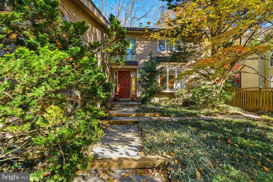 Nestled in the desirable enclave of Riderwood Station, this contemporary-style home presents a rare opportunity to bring your vision and create the home you’ve always imagined in this distinguished Ruxton retreat.  Surrounded by nature and mature landscaping, this unique court of only 9 homes is ready for its newest neighbor.  

Step inside the impressive two-story foyer, where your eyes are immediately drawn through the open layout to the wall of windows framing serene views of the surrounding greenery. The home has been freshly painted throughout and features brand-new plush carpeting, creating a move-in-ready canvas for your personal touch.

Just off the foyer, a cozy den or home office with a handsome stone gas fireplace and built-in shelving offers the perfect spot to unwind with your favorite book or work in peace.

 The open-concept living and dining area showcases soaring cathedral ceilings, hardwood floors and sliding glass doors leading to a spacious screened-in porch—ideal for enjoying morning coffee or evening relaxation surrounded by the sights and sounds of nature. 

 The spacious kitchen features tile flooring, generous cabinetry, a built-in desk area, and plenty of space for a comfortable eat-in dining area.  The main-level primary suite provides convenience and comfort, complete with multiple closets and an en suite bath featuring a jetted soaking tub with remote controlled hot water filling system and separate shower.

Upstairs, you’ll find two generous bedrooms, a full hall bath, and an airy loft space that can serve as a reading nook, play area, or additional office.
The walkout lower level offers exceptional flexibility, featuring luxury vinyl flooring, two additional bedrooms, a second kitchen, and a full bathroom—perfect for guests, extended family, or an in-law suite setup.
Additional highlights include a main-level laundry room with direct access to the attached 2-car garage with loft area for storage, and a gas-powered generator.  This home combines modern design with natural surroundings, offering the perfect blend of comfort, space, and potential in one of Ruxton’s most coveted neighborhoods.