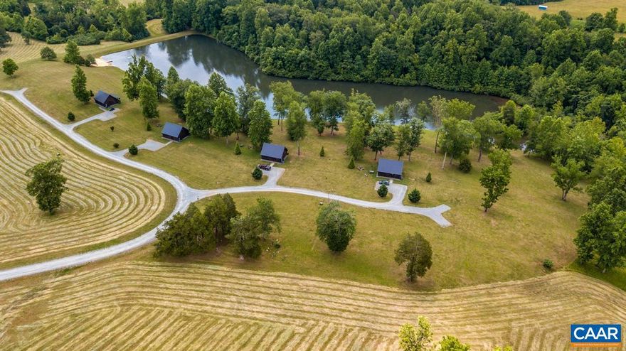 160 ACRES OF PURE BEAUTY WITH 4 ADORABLE LOG CABINS, LAKE, MOUNTAINS & FARMHOUSE. Log cabins rest on a beautiful lake with stunning mountain views from every angle. Property provides 360 mountain views with views from the elevated dome that are breathtaking This very profitable and well managed resort has opportunities for expansion. Perfect building site elevated above the lake would be a perfect wedding venue, winery, or home site. Infrastructure in place to build 2 more cabins by the lake. Farmhouse provides another living quarter or could be rented for additional income. The cabins stay booked year around and provide a unique place for people to relax. Revenues of $338,978 in 2020 and $362,289 in 2021. Revenues can easily be increased by renting out the farmhouse. Prime location only minutes away from Wintergreen Resort, vineyards, breweries and 30 minutes from the Charlottesville area. Business and business assets sold with the property.,Formica Counter,Soapstone Counter,Wood Cabinets,Fireplace in Living Room