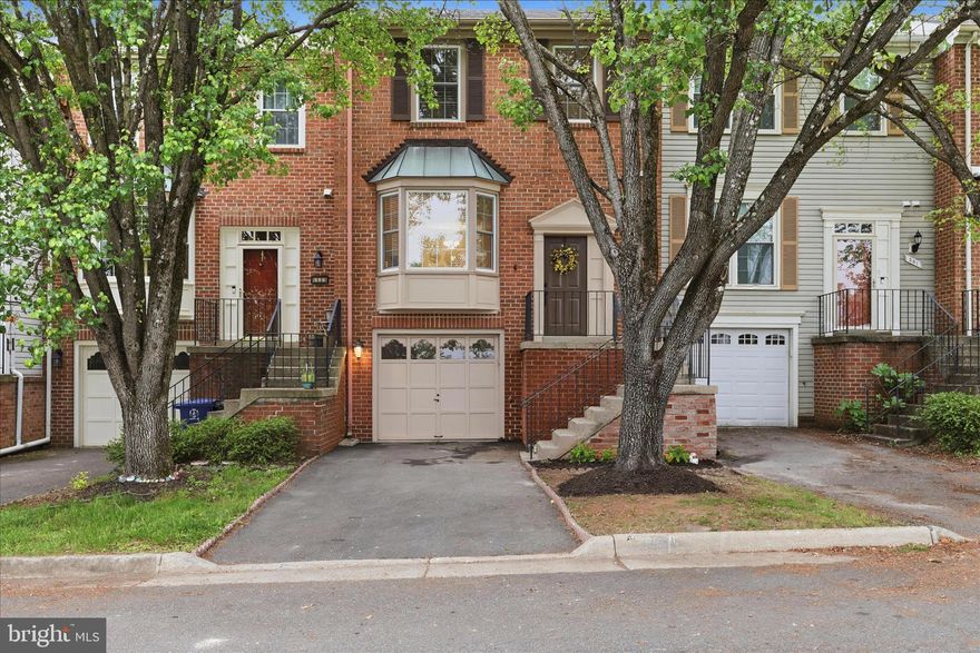 Offer deadline Sunday, May 3, 2026 at 10am.
Welcome home to this beautifully maintained brick-front townhome in the highly desirable Roxboro community of Leesburg! Offering three finished levels and over 1,800 square feet of living space, this move-in ready home combines comfort, style, and an unbeatable location.
The main level features a bright and inviting living and dining room combination with hardwood flooring, crown molding, chair rail detail, and a charming bay window that fills the space with natural light. Just a few steps away, the eat-in kitchen features new stainless steel appliances, granite countertops, and new luxury vinyl plank flooring, with a sliding glass door leading to a large, freshly stained deck—perfect for entertaining or relaxing outdoors.
Upstairs, the primary suite impresses with a vaulted ceiling, walk-in closet, and a private bath complete with a tub and separate shower. Two additional bedrooms and a full bath provide comfortable accommodations for family or guests. 
The fully finished lower level offers even more living space with a versatile family room, ceramic tile flooring, a half bath, and a dedicated laundry room with a wood burning fireplace with direct access to the one-car garage. A walk-out slider leads to a patio and fenced backyard, creating a great space for indoor-outdoor living.
Recent updates include fresh interior and exterior paint, a new 45-gallon water heater, lighting and plumbing fixtures and toilets, garbage disposal and major systems including the HVAC and roof replaced in 2018. The fireplace conveys as-is and has not been used by the current owner.
Ideally located near major commuter routes 7 and 15, downtown Leesburg, shopping, dining, top-rated schools, Dulles and Leesburg airports and the W&OD Trail, this home offers the perfect blend of lifestyle and location!