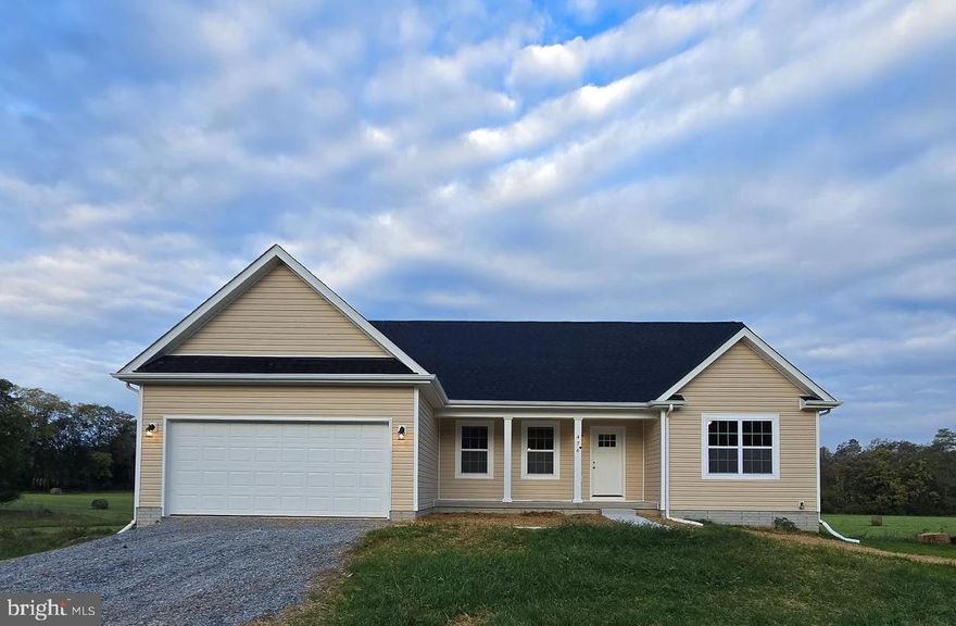 September 2024 delivery on this New ranch home on 10 +/- acre lot. 1566 square foot Ranch style home boasts the sought after split bedroom design. The kitchen/dining combo is open to the expansive great room and features vaulted ceilings. Granite, ceramic, luxury vinyl plank flooring, carpet and stainless steel appliance package. Primary bath has a separate shower and soaking tub. Home is larger than it looks providing maximum usage of interior space. The front porch is great for evenings relaxing in a country setting that is close to amenities. Buyer pays transfer tax stamps. Measurements are approximate. The pictures will be similar to your new home with most finishes selected by the builder. Including upgraded white cabinets, Bianco Diamante  or Luna Pearl granite & stainless steel kitchen appliances.  Horses and chickens are allowed.