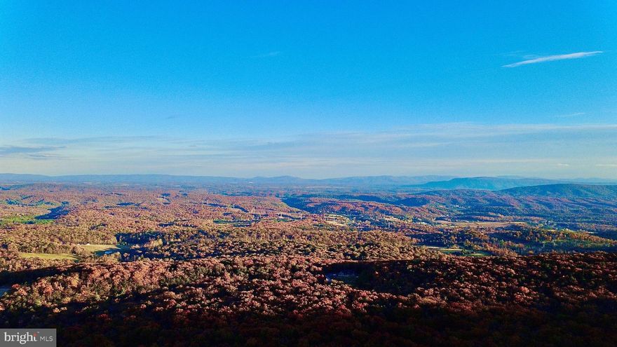 Attention Builders! 4 Pack of contiguous building  lots in Wilde Acres -Mountain Falls Park, you have the opportunity to construct your very own mountain top retreat. Mountain Falls Park is conveniently located, just a short drive away from Stephens City or downtown Winchester, VA, providing an easy commute while still offering the seclusion and serenity of the mountains. Immerse yourself in park-like living within a wooded setting. These four lots not only provide immediate possibilities but also promise potential investment growth in the future. These four lots have some of the best mountain views in the neighborhood without loosing ease of access to town.   The expansive lot 13a, spanning three-fourths of an acre, already possesses a recorded 4 bedroom perc. certificate, making it ready for construction. With the purchase of this property, you not only gain privacy but also the opportunity to potentially build additional homes on the other three lots. Fox Trail lot  10, 11, and 12 are included with the purchase of lot 13a  for you to chose to do what you wish with, secure your privacy or perhaps build additional homes?  In total, this sale offers over an acre and a half of land. Furthermore, the four lots conveniently border the undeveloped common area grounds, thus ensuring an exceptional natural ambiance. Tax rates included in this listing are for all four lots combined however the HOA fees apply to each individual lot.  Buyer's should do their own due diligence.