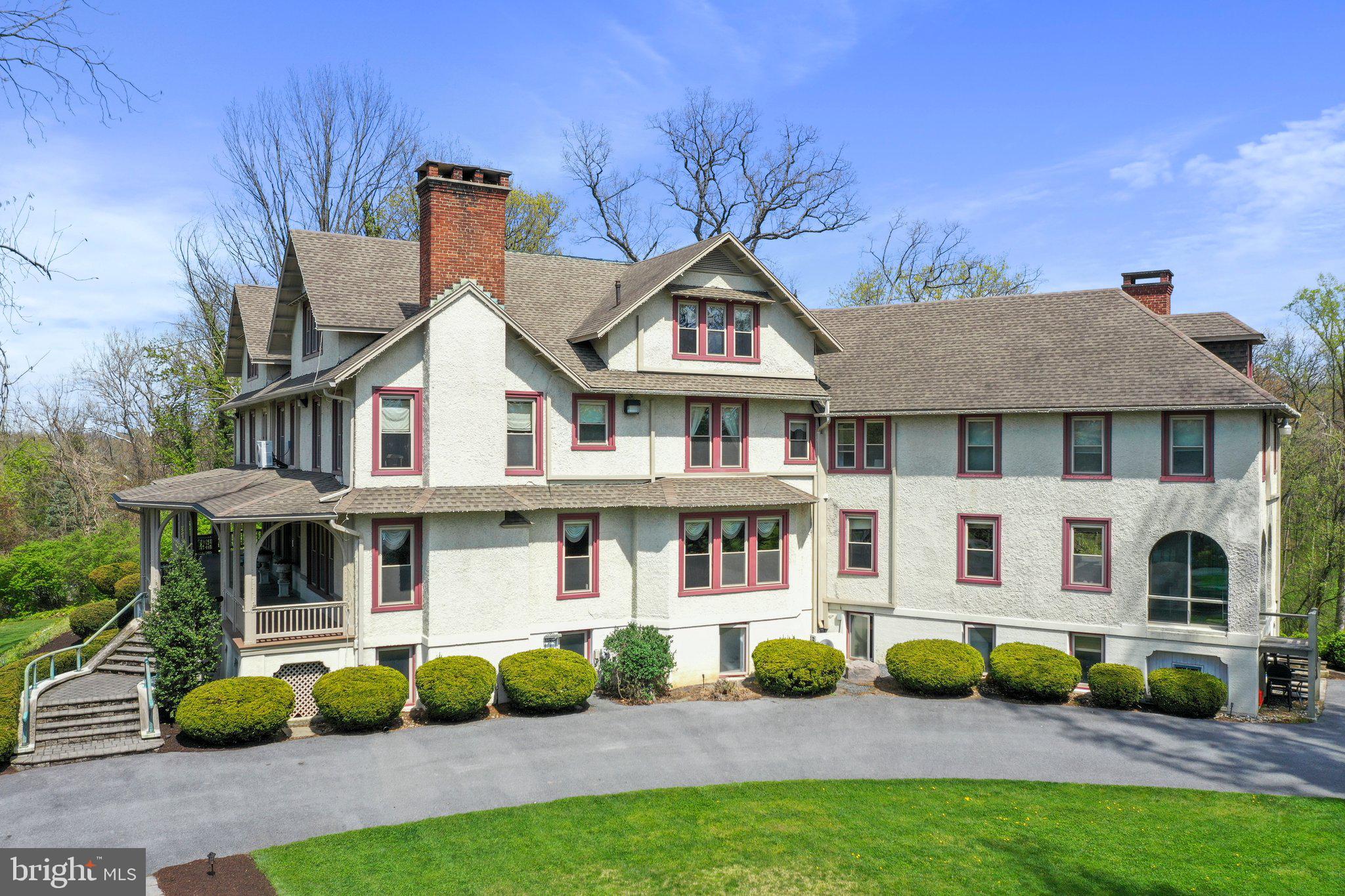 Discover the epitome of elegance and heritage at this charming bed and breakfast, where every detail tells a story. Situated in a picturesque setting, this historical gem offers a unique blend of comfort, culture and timeless beauty. Indulge in the rich history and musical legacy of the steinway piano, a rare treasure that adds a touch of grandeur. Whether you're a music enthusiast or simply seeking a tranquil escape, this bed & breakfast promises an unforgettable experience to your guests. The private residence offers 3 bed/ 3 bath PLUS an additional 1 bed/1 bath apartment. All furnishings convey. The great room offers African ribbon mahogany with original lighting and American chestnut in the grand foyer. Scenic creek frontage adds to the overall experience. Windows, roof, HVAC split systems have been updated.