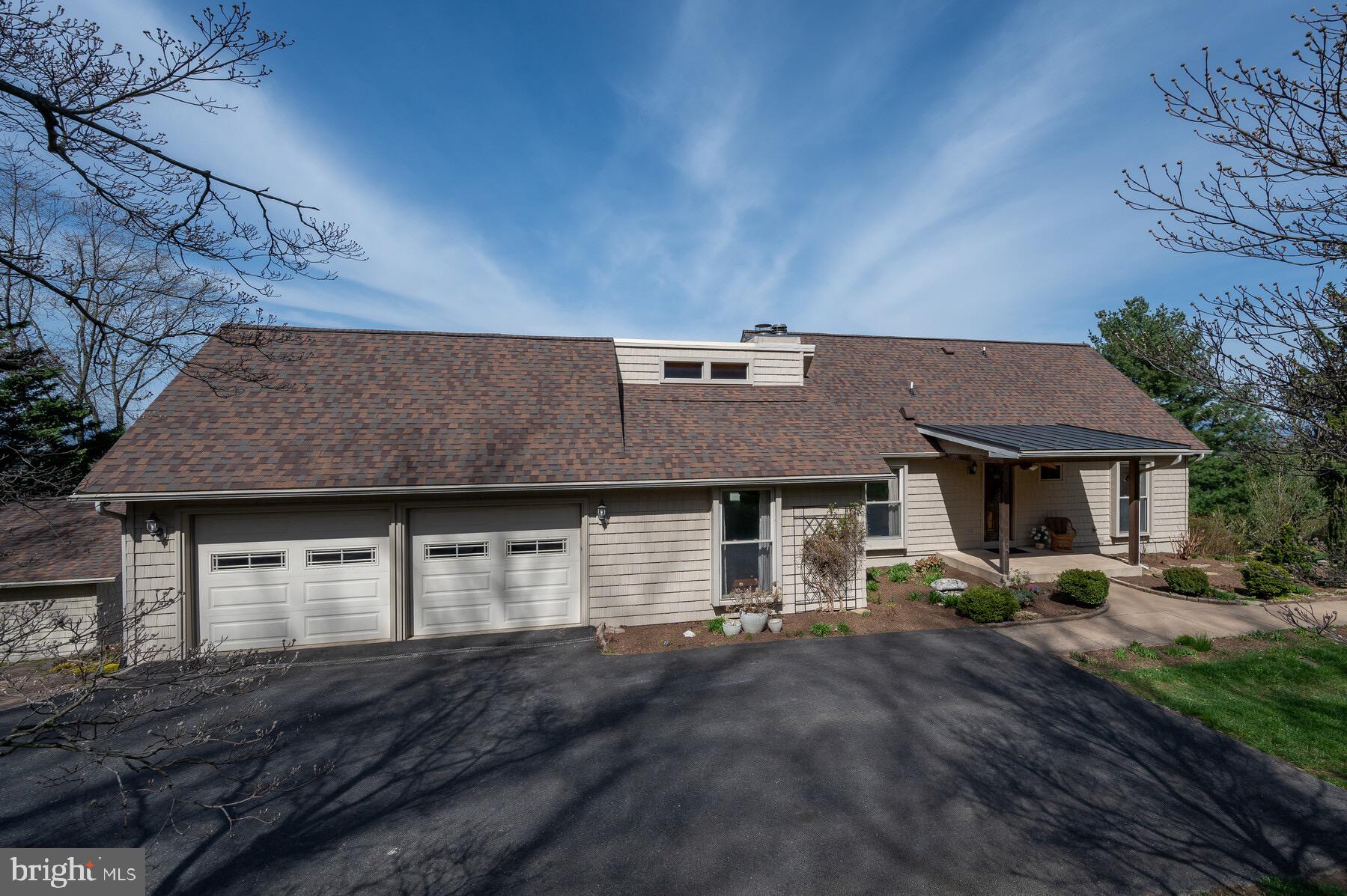 If you are looking for a one of a kind and no cookie cutter, look no further. This 4 bed, 2 full bath, charming cape cod has been lovingly cared for by the current owners since 1977. Some of the features include: brand new roof 2020, electric system updated in 2009, HVAC approx 5 yrs new, newer windows. 5 year new 50 gal water heater, washer/dryer within 5 years new, solid oak wood floors just refinished and the entire house freshly painted. The Brazilian cherry wood floors adorn the family room. The roof over top of porch and deck are standing seam copper and should last 100 years. The bathrooms have brand new fixtures and new "Lifeproof" flooring that looks like marble stunning yet durable. There is also a detached workshop w/polished concrete floors and electricity, and three large decks with new pressure treated wood. Almost an acre of pure beauty and million dollar mountain views. You won't want to miss seeing this one! Sold "As Is". Hot tub and pellet stove convey.