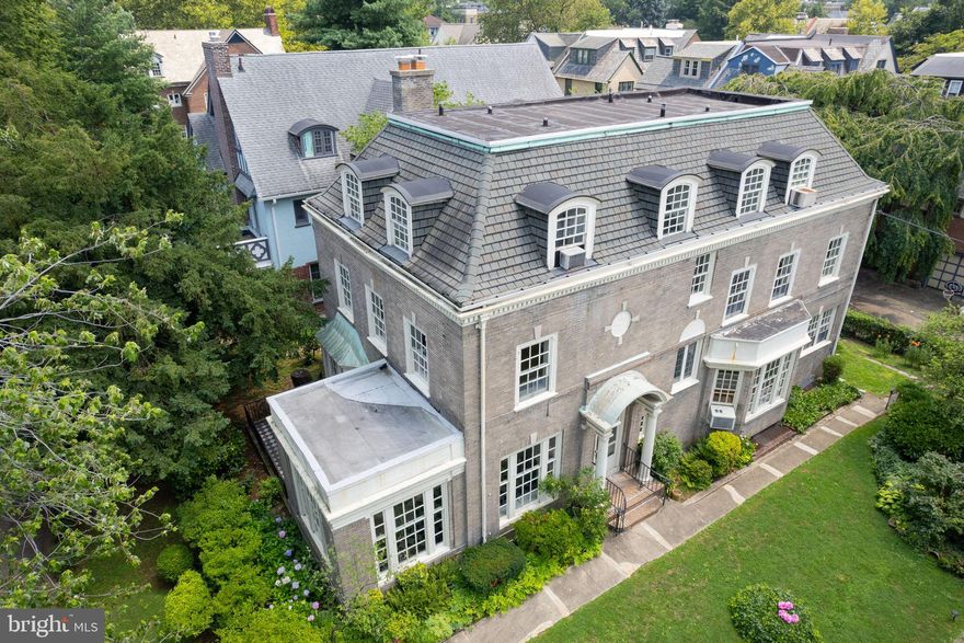 In the 1920s, The Philadelphia Inquirer called Garden Court "the most exclusive location in West Philadelphia"  and it still holds true 100 years later! 

This is a rare opportunity to own an exceptional detached home in the heart of a phenomenal neighborhood. Located in the highly desirable Penn Alexander School Catchment and close to bucolic Clark Park (with the fantastic Farmers Market), this sprawling home sits on a serene tree-lined block within steps of wonderful shops, restaurants, universities, and hospitals! 

This home has abundant light, incredible space, and tons of original character throughout! With details like stunning wood floors, leaded glass windows, and built-in armoires, this lovingly maintained home is ready to welcome its next owner! All this and TWO CAR GARAGE PARKING with additional parking in front of the garage. 

The first floor features an expansive living room with gorgeous moldings, a fireplace, and a mantle. The serene sunroom leads to the perfect tiled deck nestled in abundant greenery. The huge dining room with a bay window is perfect for family gatherings. Rear kitchen with new washer & dryer, black and white tile floor, and cozy breakfast room. Entrance to a giant basement with tons of storage space, two newer Crown boilers, and the oversized garage. 

The sunny hall leads to the second floor with the expansive main bedroom and en suite bath. The idyllic middle room has a  gorgeous window and views of mature trees. Nice hall bath and another extra large bedroom with a separate sitting room and beautiful glass door dividers. 

The third floor features more large bedrooms- one with three exposures making the perfect studio space or additional bedroom! This floor also features a tiled bathroom with a clawfoot tub and a cedar closet.

This home is truly a must-see!