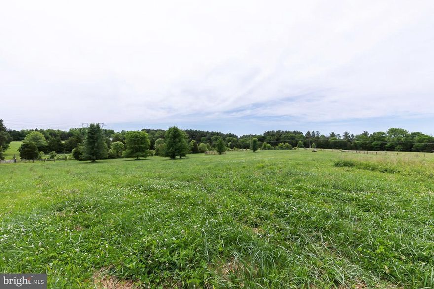 12 acres of privacy waiting for you to build your dream home.  Quiet gravel lane but close to Northern VA with access to major commuter thoroughfares.  Active well and electrical meter already on site.  Certified conventional perc site.  The lot is ready for your horses (or farm animals), fully fenced and cross fenced with a woven wire horse fencing forming 3 pastures, each with automatic water troughs.  Phone and highspeed internet available. No HOA and great schools.  Tranquil living with beautiful views, blooming trees in the pasture, and flowers along the banks of the stream.  The adjacent 10-acre lot and 15-acre lot with large single-family home can be purchased all together if desired.