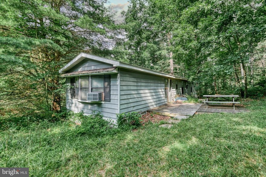 Discover 15.71 acres of prime hunting land spanning two tax parcels (01-01-018 with 10.89 acres + 16-22-051 with 4.82 acres) being sold together! This property features a mobile home already equipped with water and electric — perfect as a hunting cabin or weekend retreat. The land is rich with highly sought-after white oak and black oak trees, offering potential timber value. Enjoy abundant wildlife and privacy just minutes from state game lands and excellent trout streams, making this an outdoor enthusiast’s dream. Don’t miss this opportunity to own a beautiful slice of nature ready for hunting, recreation, or investment. Being sold as-is.