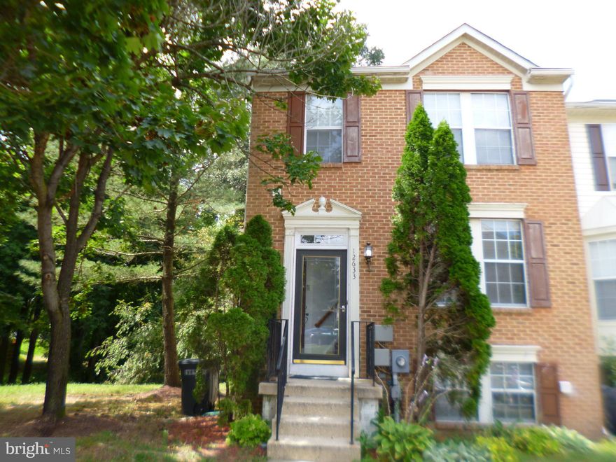 Former Model TH with Sun Room Addition and Deck! Corner unit, Two Master Bedrooms with private Baths upstairs. Full Finish Basement with extra/third Bedroom and Rec Room, with full Functional kitchen. It features two sets of full kitchens and two sets of washers and dryers. wall-to-wall carpet throughout. walkout basement to the woods/Creek. It's move-in ready. Please Go & Show.