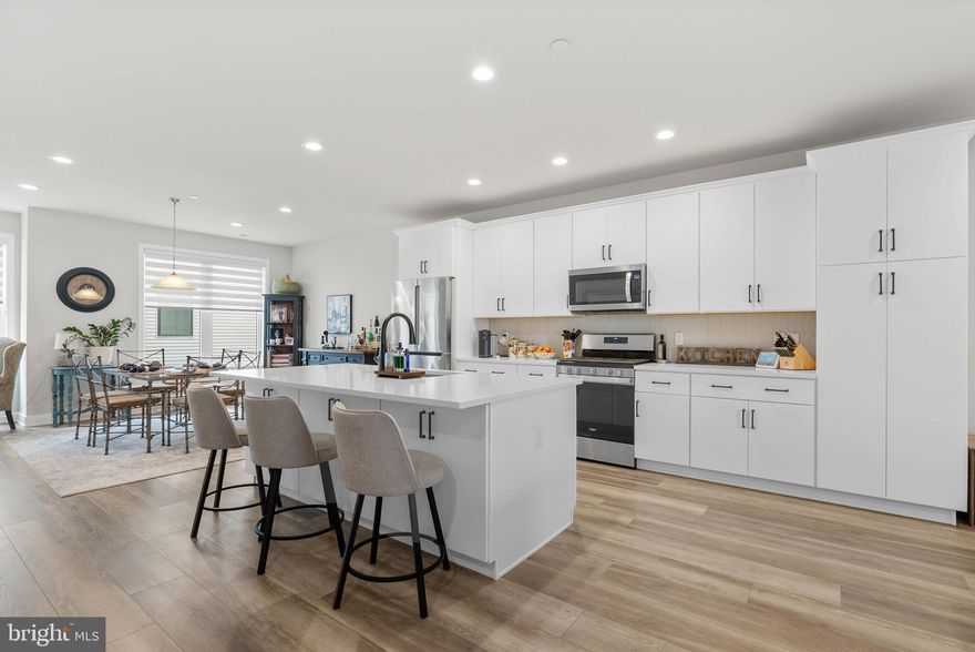 Modern Luxury Living in the Heart of King of Prussia.

Welcome to Overlook at Town Center—a private, sought-after community offering modern homes, a prime King of Prussia location, and unbeatable access to major highways. Built just two years ago, 704 Brewster Ave is a stylish 3-bedroom, 2.5-bath residence featuring a 1-car garage, a driveway parking space, multiple terraces, and an expansive private roof deck.

The entry-level provides dual access from both the front door and the rear garage. Head upstairs to the main living level, where high ceilings, neutral wide-plank flooring, and tall windows flood the space with natural light. A cozy living room opens to a private terrace, and a bright corner nook offers the perfect space for a home office or reading area.

At the center of the home is the gourmet kitchen, equipped with sleek white cabinetry, stainless steel appliances, quartz countertops, a tile backsplash, and a large island with seating for three or more. Adjacent to the kitchen, the dining area is ideal for entertaining. A powder room and a bonus study or hobby area complete this level.

The upper floor hosts a bright and spacious primary suite with its own private terrace, a luxurious ensuite bath with a double vanity, glass-enclosed shower, private water closet, and a generous walk-in closet. Two additional bedrooms, a second full bathroom with a double vanity, and a convenient laundry room complete the level.

At the top of the home, you’ll find a massive roof deck—perfect for summer barbecues, relaxing evenings, and enjoying panoramic views.

Living in Overlook at Town Center means being minutes from everything. The King of Prussia Mall—one of the largest retail destinations in the country—offers shopping for every style and budget. Trendy new restaurants, exciting entertainment options like indoor skydiving and a movie theater, plus everyday conveniences like Costco, Trader Joe’s, and Wegmans are all nearby. You’ll also be close to top medical facilities including Main Line Health and CHOP. Commuting is a breeze with quick access to I-76, I-276, Route 422, and Route 202.

Don’t miss your chance to experience elevated living in one of the most vibrant areas in the region. Schedule your tour today.

*If Buyer uses preferred lender, we are offering a Free 1% Rate Reduction for the first 12 months.**