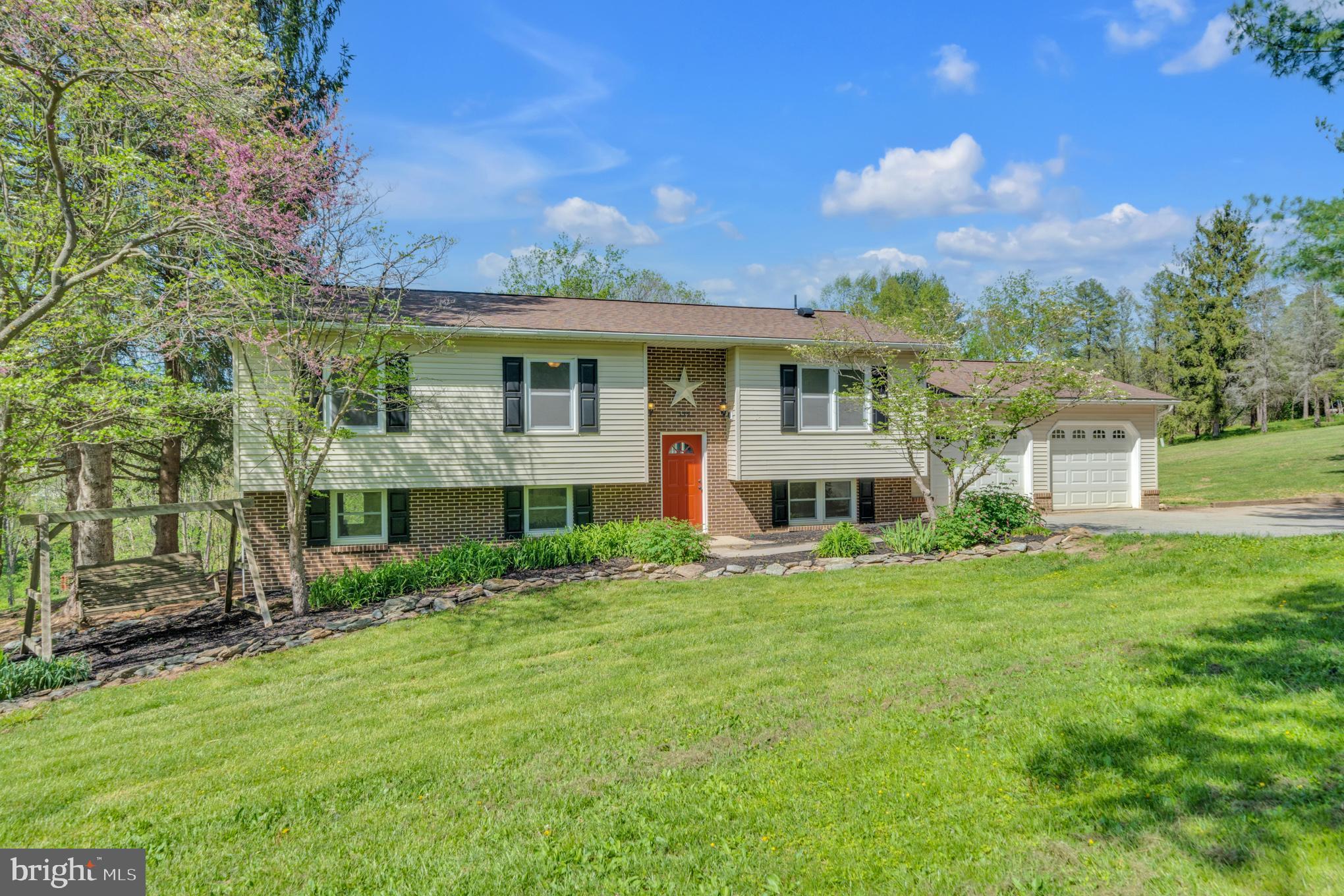 This beautiful 4 bedroom 2 bathroom Split Foyer on a country private lane is just what you have been looking for! Tucked away on a secluded and quiet private road, this charming home offers the perfect blend of comfort and country living. Featuring an open floor plan, gorgeous views from living area, overlooking the pool and your 4 acre property from the upstairs deck , this place is fantastic for entertaining. Newly finished basement boasts tons of extra space including the 4th bedroom, large rec room and access to 2 car garage. This property has fenced in areas to bring you horses and a chicken coop as well. Enjoy the beauty of nature with a serene stream and wooded surroundings. This is the perfect retreat for a family seeking a peaceful county lifestyle but just minutes from downtown Hampstead, Maryland