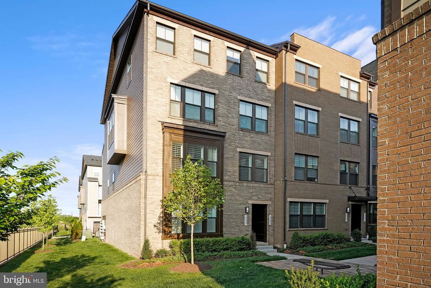 2021 energy efficient, smart home in perfect condition! Premium end unit with serene (best in development) view of pond where ducks, geese, and great blue heron gather as part of their home along Kincora’s Scenic Heron Nature Trail. 3 spacious bedrooms, 2 full bathrooms and a powder room. Wide plank floors and oak stairs. Custom hardwood plantation shutters on all windows and doors (including Bermuda window and patio door for light blocking in bedroom). Contemporary finishes include upgraded cabinetry, slab granite countertops, raised tile backsplash, stainless appliances, and cultured marble countertops. Vinyl tilt-out windows. Outdoor balcony, one car garage with electric/hybrid vehicle charge port, and driveway. Dulles Airport and Dulles Town Center, Top Golf, One Loudoun, Rt. 28, 7, 267, 95, 66 and many attractions coming soon within the Kincora Development. Monthly fee includes water, sewage, trash, common area maintenance & property management.