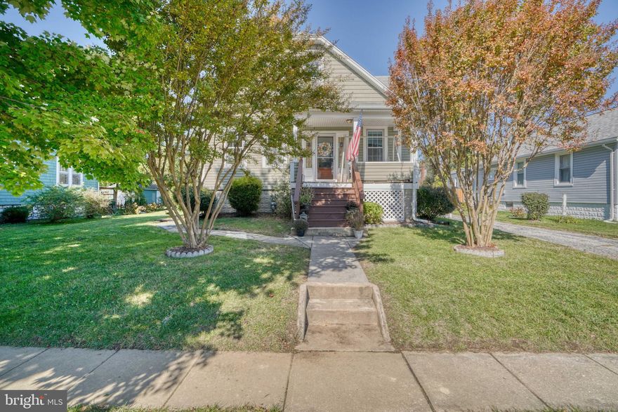 LARGE(1856sf)Charming Cottage immaculately maintained. This lovely home features a newly renovated kitchen, new appliances, beautiful front porch,  9+ft Ceilings; solid Hardwood Floors on 1st & 2nd levels; 1st floor Den/Libr; master bedroom with sitting room, and Full unfinished basement with half bath. Covered Porch, 5 car Driveway, & beautiful original Stained Glass Window. Large spacious lot and all but three windows have been replaced. This home is a must see!