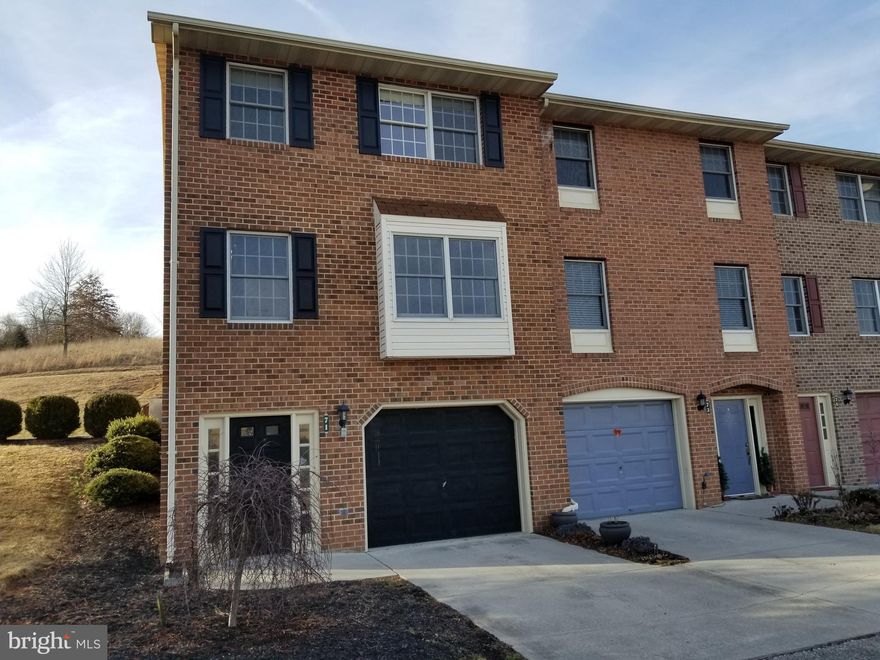 Come see this beautiful END UNIT TOWN HOME in Falling Waters. The view is gorgeous and sits back from Route 11. Attached garage, back deck, two ample sized bedrooms, with a full bath and one-half bath on the main level.  Location is  truly desired being close to I-81, schools, shopping and more! Pets allowed case by case. BEST PART? (besides everything else), WATER, SEWER, TRASH, AND LAWN CARE INCLUDED in the RENT. That's what I call easy living. Complete with WASHER & DRYER. Similar photos. Apply online.