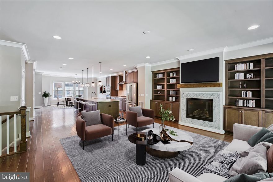 Luxury Elevator Townhome in the vibrant Crest of Alexandria Premier 55+Active Lifestyle Community * A contemporary open concept design showcases a modern gourmet gas cooking kitchen with an expansive island creating a sensational entertainment  space * Featuring stunning hardwood floors throughout, a gas fireplace with a Carrera Marble surround & garden access from your main living area to your private tree lined oasis *  The design choices are all tasteful, upscale and a perfect palate for any decor * With extra storage, 2 car garage, spacious rooms,  excellent natural light, and a vinyl picket fence, this Energy Star Certified home is the complete package in easy care living! Join in the fun at the Clubhouse where you enjoy use of all facilities to include the gym, yoga room, living room/library, dining room, kitchen and the very popular pub * Surrounded by nature, including walking trails, Pickleball courts, & beautifully landscaped green space, this 40+ acre property is truly a destination * With exceptional proximity to Wegmans, Kingstowne, Fort Belvoir, Metro stations, major highways and airports, this pristine home is turnkey and ready for you to begin your best lifestyle * AND this home comes with a VA Assumable mortgage of $550,000 at 3.375% ! Ask your real estate professional for a showing!