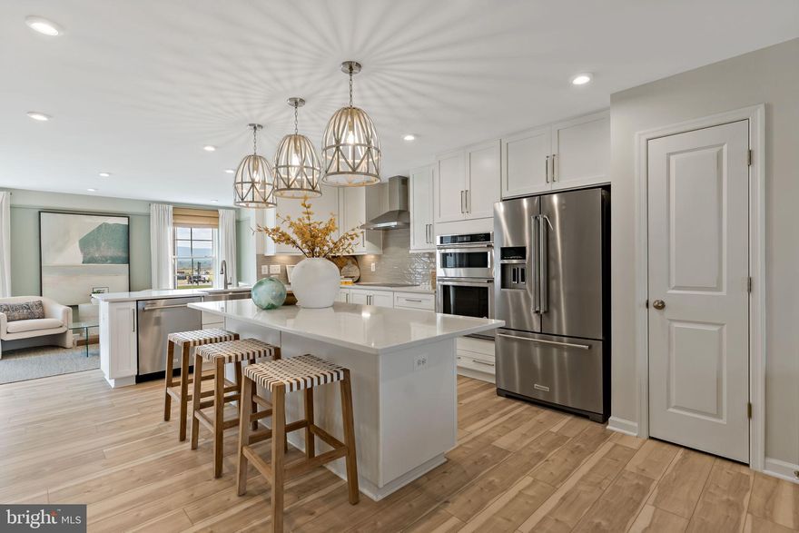 OFFERING UP TO $15,000 IN CLOSING COST ASSISTANCE FOR PRIMARY RESIDENCE WITH USE OF APPROVED LENDER AND TITLE.*
Whitehall II – This quick move-in home will be ready by late April/early May. With thoughtful structural additions, including a morning room, 4-foot extension, and a first-floor ensuite with a full bath, this home offers exceptional space and flexibility. The main-level bedroom serves as a private suite (13'2" x 11'3") with its own full bathroom and stand-up shower. A walk-up basement provides easy access to the backyard, and the home sits on a spacious homesite just under 9,000 square feet. Inside, you’ll find a gourmet kitchen with white cabinetry, upgraded quartz countertops, pendant lighting over the island, and an upgraded lighting package throughout. The primary bathroom features a double vanity, and the walk-in closet is as large as a bedroom. There’s much more to see. Schedule your visit and experience it in person. *Photos may not be of actual home. Photos may be of similar home/floorplan if home is under construction or if this is a base price listing. AGENT REGISTRATION REQUIRED.