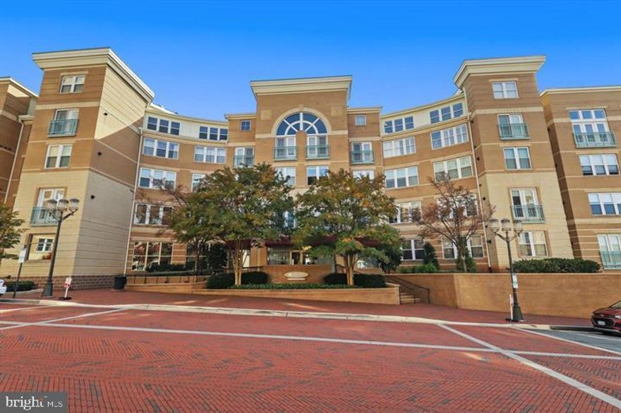 Location is everything! Outside the door is the wonderful movie theater, shops, restaurants of Reston Town Center. Unit is located in the interior, facing pool/courtyard on the second floor. Two master suites, full size washer/dryer, underground parking spaces and a storage unit convey.
