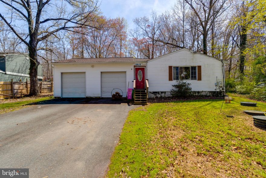 Welcome to this 2 bed, 1 full bath single family home with an oversized two car garage sitting on almost half an acre in Joppa.  This home sits in the Fallston school district.  Pull into the driveway and take the steps to a door that enters a breezeway located between the garage and the house.  Here you will find the front door to the house.  Upon entering you are greeted with an open concept living room, dining area and kitchen.  The living area has lvp flooring throughout, a large bay window to allow natural light in and a wood stove which is capable of heating the whole house.  The kitchen has vinyl flooring and comes with a refrigerator, stove, double sinks, backsplash and cabinetry.  Taking a short hallway from the kitchen leads you to two bedrooms and a full bath with a tub/shower combo.  A rear door off of this hallway leads you out to the wooded, secluded rear yard.  The massive two car garage is separate from the house but has enough room for two cars, working space and/or storage.  Much of this home has been well maintained such as a new heat pump in 2016, a new roof in 2013, new well pump in 2018, and a new well in 2003, and septic in 2005.  You can't find a house in Fallston school district for this price, some finishing touches could make it the perfect home for you, come see it today!  This is an As Is sale.