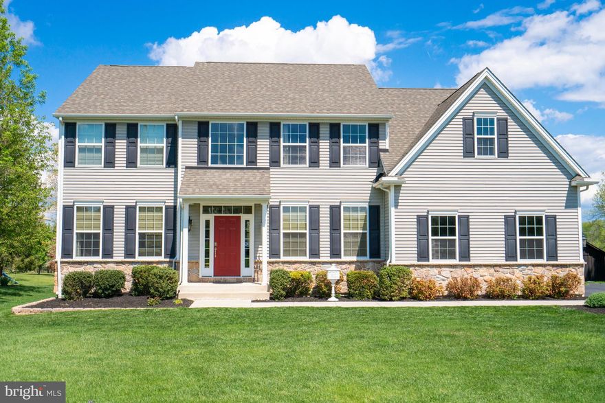 Welcome to this exceptional and immaculate 4 bedroom, 2.5-bath colonial set on over 2 picturesque acres in the award-winning Unionville-Chadds Ford School District, offering the perfect blend of modern design, thoughtful upgrades, and serene surroundings with no HOA restrictions. From the moment you arrive, the home’s curb appeal and peaceful setting on a lightly traveled road set the tone. Step inside to a bright, two-story Foyer enhanced by custom shiplap detailing, creating an immediate sense of warmth and style. The main level features a desirable open floor plan with abundant natural light and newer hardwood flooring throughout most of the first floor. The heart of the home is the beautifully appointed Eat-In Kitchen, complete with granite countertops, a center island, sleek cabinetry, recessed lighting, pantry, pot rack, and stainless steel appliances including a gas range - perfect for both everyday living and entertaining. The Kitchen flows seamlessly into a spacious Breakfast Area with sliding glass doors to the rear deck offering amazing views of the bucolic countryside out back, and access to the stunning Family/Great Room with soaring cathedral ceilings and a cozy gas fireplace. Additional main-level highlights include formal Living and Dining Rooms enriched with hardwood flooring, custom moldings, and refined finishes added by the current owners, as well as a private Office with French doors - ideal for today’s work-from-home lifestyle. A convenient Mudroom/Laundry Room with interior access to the 2-car garage completes the first floor. Upstairs, retreat to the spacious Primary Bedroom En-Suite featuring a tray ceiling with ceiling fan, walk-in closet, and a luxurious en-suite Bath with a soaking tub, dual vanity, and separate shower. Three additional generously sized bedrooms share a well-appointed hall bath. The 4th Bedroom even has its own sitting room! The second floor also features brand new carpeting (2024), offering a fresh, move-in ready feel. The full basement provides excellent potential with high ceilings and legal egress, ready to be finished for additional living space if desired. Outside, enjoy the expansive deck overlooking a sweeping backyard that backs to an amazing open space, showcasing breathtaking views of the Brandywine river valley. Enhancing both function and charm, the sellers have added a shed and barn (2019), ideal for storage, hobbies, or outdoor enjoyment. Additional upgrades include a full interior repaint (2019), extensive wainscoting and trim enhancements (2021), and a newer water heater (2021), giving buyers peace of mind and a truly turnkey experience. With nearly 3,000 square feet of living space, thoughtful updates throughout, and a flexible settlement timeline, this home offers a rare opportunity to enjoy space, style, and location all in one. Enjoy all the perks of country living while still accessing everything easily at your fingertips: all kinds of shopping and dining in nearby towns of West Chester and Kennett Square, easy access to parks and trails including Longwood Gardens, and a short drive to major routes for commuting. Don’t miss your chance to make it yours!