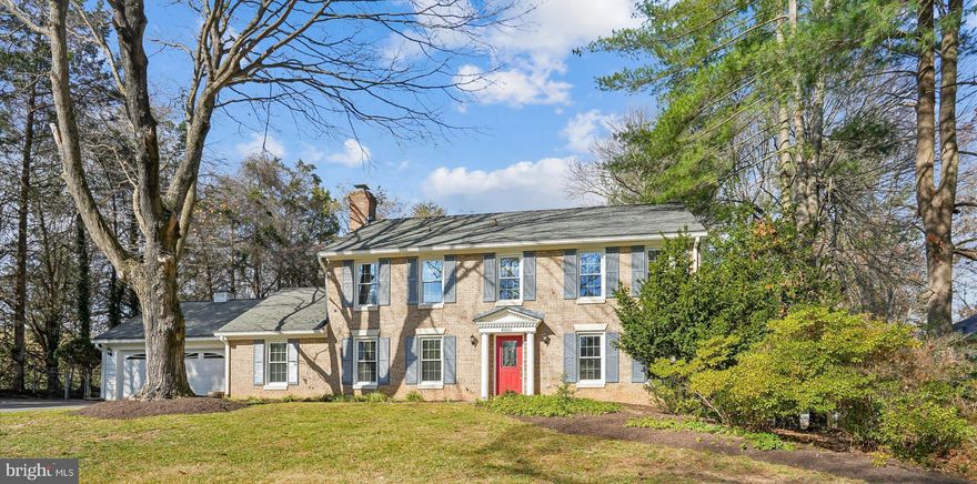 Welcome to this classic Colonial home perfectly sited on a beautiful lot in the wonderful neighborhood of Flower Valley. This sun filled  home artfully  blends formal and casual spaces in an arrangement perfectly suited for today's modern living and entertainment.   Upon entering through the red door you are greeted to a welcoming foyer, spacious Living Room, Formal Dining Room and inviting Family w/ built ins, and wood burning fireplace.  The Living, Dining and Family rooms have newly refinished hardwood floors.  The Table Space Kitchen, w/ Stainless Steel appliances and pantry  features glass doors off the eating area opening to a flagstone patio and rear gardens. The main level is completed with a laundry room, powder room and guest closet.  The upper level private quarters boasts a owner's bedroom with dressing area, en suite bath and a walk in closet.  There are 3 additional family size bedrooms, one with built ins, and all the bedrooms, the upper staircase and hallway have newly refinished hardwood floors.   Completing this level is the hall ceramic tub bath along with the linen closet.  The lower level Recreation Room  boasts new carpeting, a huge cedar closet and the home's 3rd full bathroom. A Bilco door from the Rec Room opens to the rear yard.  The home has a freshly painted interior, new lighting, updated windows, roof and an oversized 2 car garage with opener. The property sits on a generous 0.35-acre lot, providing plenty of outdoor space for gardening, play, or simply enjoying the fresh air. Imagine summer barbecues in the backyard or quiet evenings under the stars—this home is a canvas for creating cherished memories. Beyond the walls of this lovely home, the neighborhood thrives with a strong sense of community. This Colonial is more than just a house; it’s a place where you can truly feel at home. The kitchen awaits your special touches!  Don’t miss the opportunity to make this charming residence your own!
