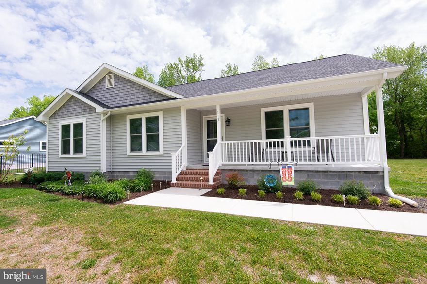 Modern luxury meets total tranquility! This energy-efficient home features a bright, open interior with LVP flooring and quartz countertops. From the wide hallways to the serene primary bedroom, every inch of this home feels spacious and inviting. Relax on the front porch or back patio, tucked away on a quiet dead-end street. Schedule your tour today!