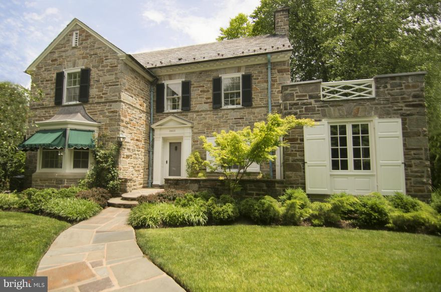 NEW PRICE! Elegant stone Guilford home on deep, landscaped private lot.  The interior of this pristine 4 bedroom 3 full and 2 half bath home has been meticulously updated including brand new Sub-Zero and cooktop, updated BA's, master & powder w/heated floors,lower level family & rec rms w/stone fireplace. Gorgeous rear garden with slate terrace, covered porch & lush landscaping. Sunroom,Garage.