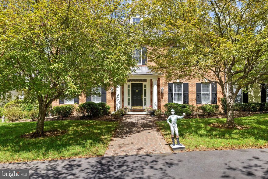 This stunning residence boasts 4 bedrooms , 3 1/2 baths and 3 fireplaces.  Open floor plan, high ceilings and an abundance of natural light.  Gourmet kitchen, top of the line appliances and custom cabinetry.  Fully finished basement and a partially covered rear deck that spans the entire back of the house.  There is a large 2-car attached garage, a detached carriage house with 2 garage spaces.  Fenced in pool with gazebo, mature plantings, fruit trees and a spring fed pond.