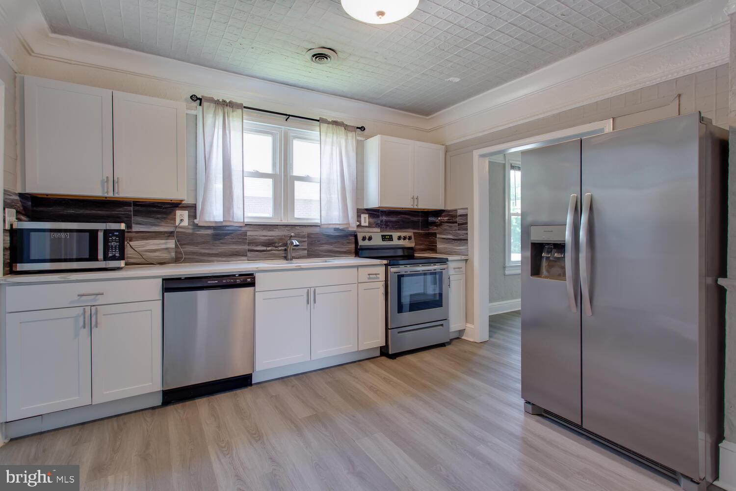 This cute 1930's home 🏠 is the perfect starter home. Located in the heart of the Town of Indian Head! Enjoy the ultimate walkable lifestyle with the Town Hall 🏛️ and the new Oasis Fresh Foods Market just a stone's throw away – imagine running errands or attending community events without ever needing your car.
For those employed with the Navy,🚢⚓ the property is ideally situated less than a mile from the Naval Surface Warfare Center, making for an effortless commute.......Experience the ease of living in a well-established neighborhood with essential amenities at your fingertips and a strong connection to the local community. Don't miss your chance to own this perfectly located piece of the past!**All photos have been professionally staged to represent the best uses of space**
