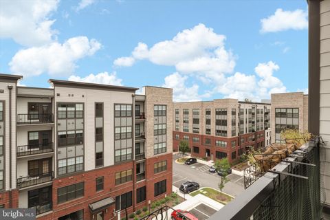 Photo of 104 Saint Ives Place #409, OXON HILL, MD 20745 (MLS # MDPG2180808)