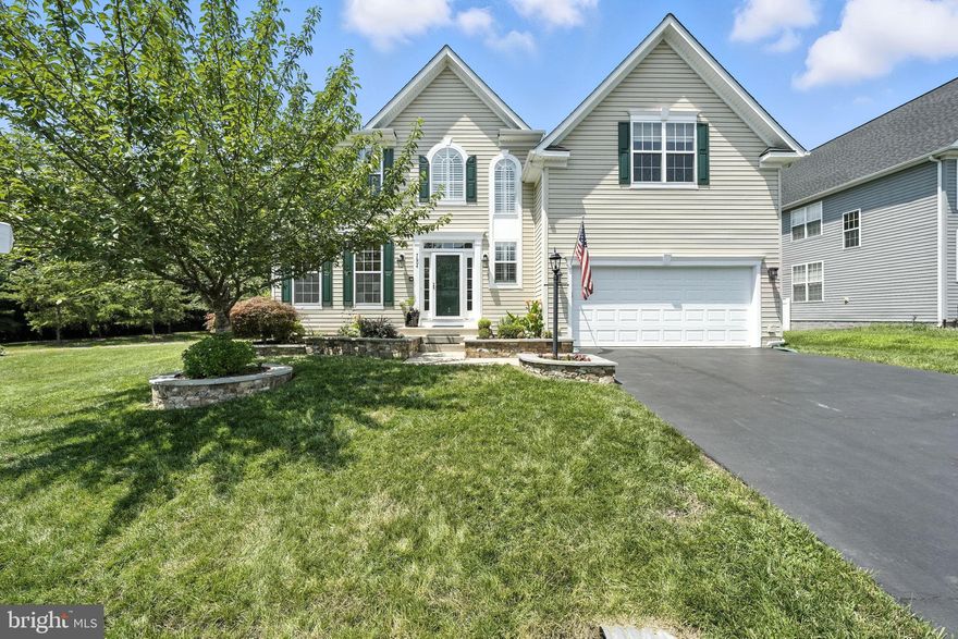 Welcome to this beautifully maintained Coventry model, featuring a rare five-bedroom layout on the upper level—a standout feature that offers incredible flexibility for larger households, guests, or work-from-home needs! The backyard is fully enclosed with a vinyl privacy fence, featuring a double gate entrance and a Trex deck with stairs leading to the yard—ideal for outdoor enjoyment. Additional exterior highlights include an in-ground sprinkler system, hardscaping around the trees, and rear spotlights that enhance both ambiance and security.

Inside, the home features newly refinished hardwood flooring on the main level and upgraded recessed lighting throughout. The chef’s kitchen offers a gas cooktop on the island, double wall ovens, a stylish backsplash, and ample cabinetry. The formal dining room includes a tray ceiling and decorative columns. Elegant moldings flow through the main living areas, and a gas fireplace with marble surround and painted mantle adds warmth and charm. The study provides a quiet, well-lit workspace.

Upstairs, the primary suite boasts a tray ceiling, ceiling fan, walk-in closet with built-in organizing system, and a speaker connected to the intercom system. The primary bath is beautifully appointed with separate granite vanities, upgraded ceramic tile, a soaking tub, separate shower, water closet, and linen closet. Four additional bedrooms offer a mix of vaulted ceilings, upgraded molding, walk-in closets, and ceiling fans. The hall bath features dual vanities, ceramic tile, a custom listello, and a window in the shower. The princess suite includes a private en suite bath with vaulted ceiling and upgraded tilework.

The bedroom-level laundry room features ceramic tile flooring and a laundry tub, plus there are two additional linen closets for storage. Flooring includes durable Berber carpet, and the bedroom above the garage is fully conditioned with Rockwool insulation for year-round comfort.

The finished basement expands your living space with a large recreation area, dedicated gym room, pool table zone, versatile bonus room with closet, and two generous storage closets.

Additional upgrades include a whole-house water softener, humidifier on the HVAC system, new water heater (2025), dishwasher (2024), microwave (2023), , and washer (2021). Utility features include a sump pump with secondary and battery backup daylighted to the rear, attic radiant barrier insulation with added insulation between the basement and main level, and regular HVAC maintenance.

Finishing touches like plantation shutters, tile flooring in the mudroom, storm/screen door, pull-down attic stairs with zipper enclosure, insulated garage door with motorized opener, shelving, and overhead storage racks complete this well-loved home. Termite protection is in place, making this a move-in ready property offering a perfect blend of style, function, and peace of mind.