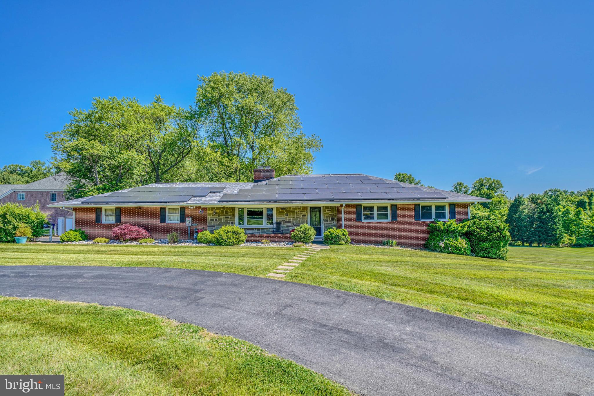 OPEN HOUSE SATURDAY 6/3 , 11:45- 1........................................Large rancher located on almost 2 acres of land in the heart of Perry Hall. This updated home was renovated in 2016 including new Roof, HVAC, Kitchen, Floors, Windows, Insulation, and soo much more. The main level boosts a primary suite with marble bathroom as well as two addition bedrooms and full bathroom. The living, dining, and extra large kitchen has been renovated to a open floor plan allowing for great flow throughout the main level with a walk out to the very large rear yard. The updated lower level features an office, recreational area, large laundry/storage room, bathroom, and a Wet Bar all with a walk out level exit! Utilize savings thru the Solar System (power purchase agreement). The home sits to the side of the 1.99 acre lot which allows for almost an acre side yard perfect for parties or a football game. The full 1.99 acres backs to forest conservation which leads to trails to Gunpowder State Park.