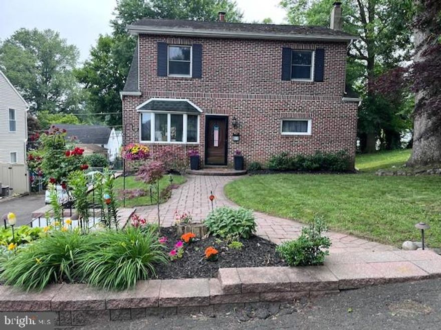 Welcome to 911 Hilton Ave.  This charming Bucks county home is located in Neshaminy school district.  This single colonial offers entry into the large dining room that flows into the the beautifully updated kitchen with stainless steel appliances including dishwasher, microwave, refrigerator and electric stove/oven, spectacular overhead and base cabinets, lazy suzie, breakfast bar, new floor, coffee bar.  Sliding glass doors to very large rear deck with steps to rear yard.  Main level hall bathroom. Living room, Office or play area depending on how you want to use it.  
2nd floor features Huge master bedroom with dressing area and 2 double closets and ceiling fan.  2 additional good size bedrooms both with a double closets and ceiling fans.  Second 3pc hall bathroom.
 Lower level features finished family room with glass block windows, Wood burning stove that can heat the whole lower level. Est 320 sqft per seller.  Laundry/Storage room with washer, dryer 2nd refrigerator and oil tank.