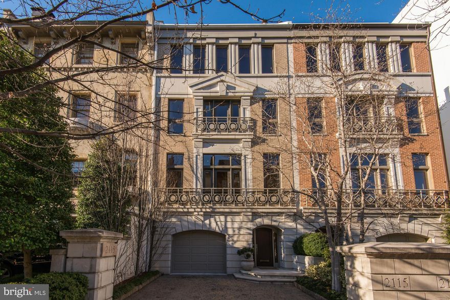 Stunning 4-level 5700 sf Kalorama TH certain to impress! Sun-filled, 11' ceilings on main lvl, open one-of-a-kind wrap-around staircase, 3 FPLs, elevator, 2-car garage plus 2-car drvwy prkg!  Gourmet eat-in Kitchen, landscaped private patio, 4 BRs, 4 full / 2 half Waterworks BAs, impressive Family Rm w built-ins and wet bar, custom built wine room; sought after location w 95 walk score!